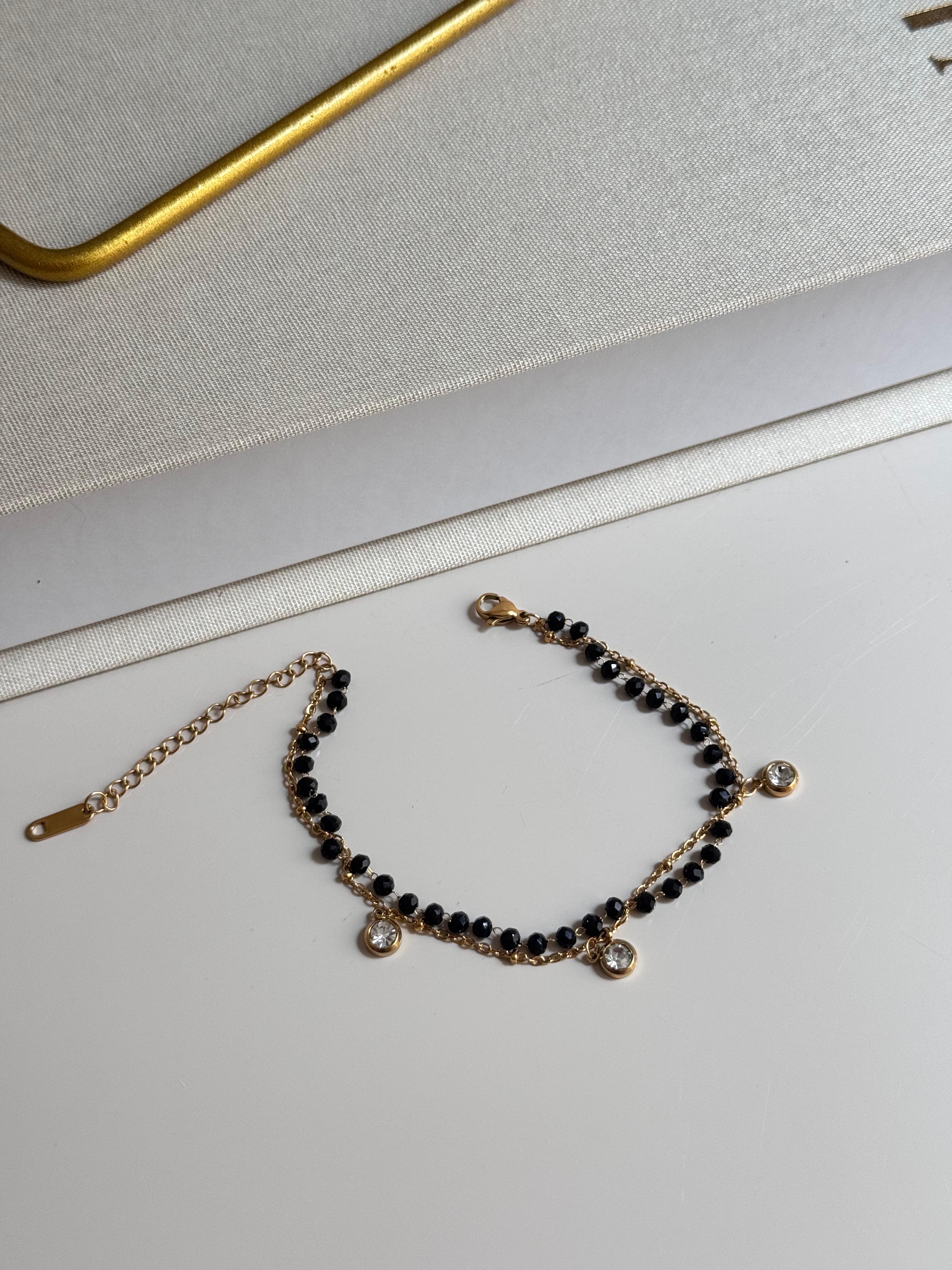 Gold Dangling Black Bead Bracelet