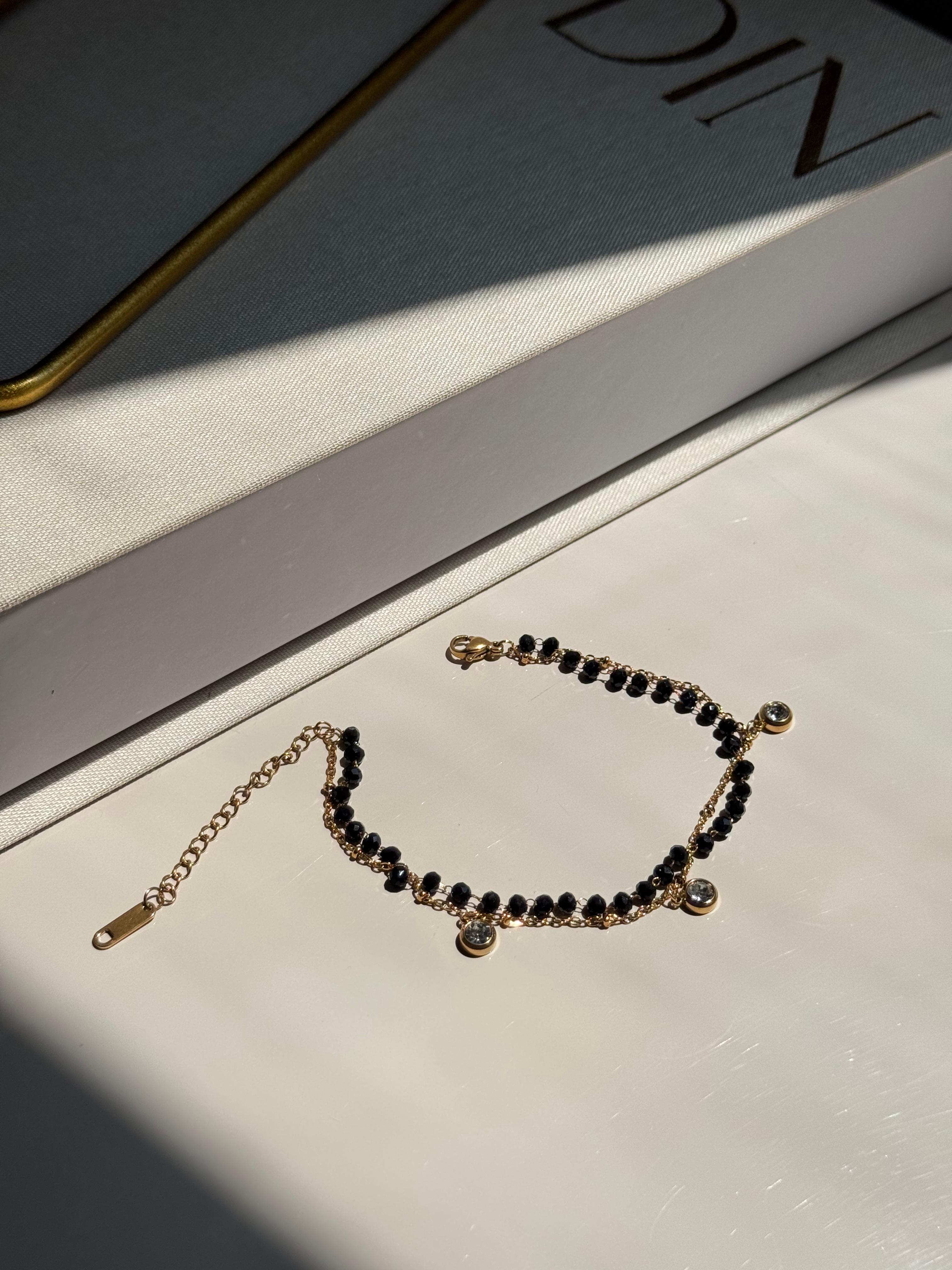 Gold Dangling Black Bead Bracelet