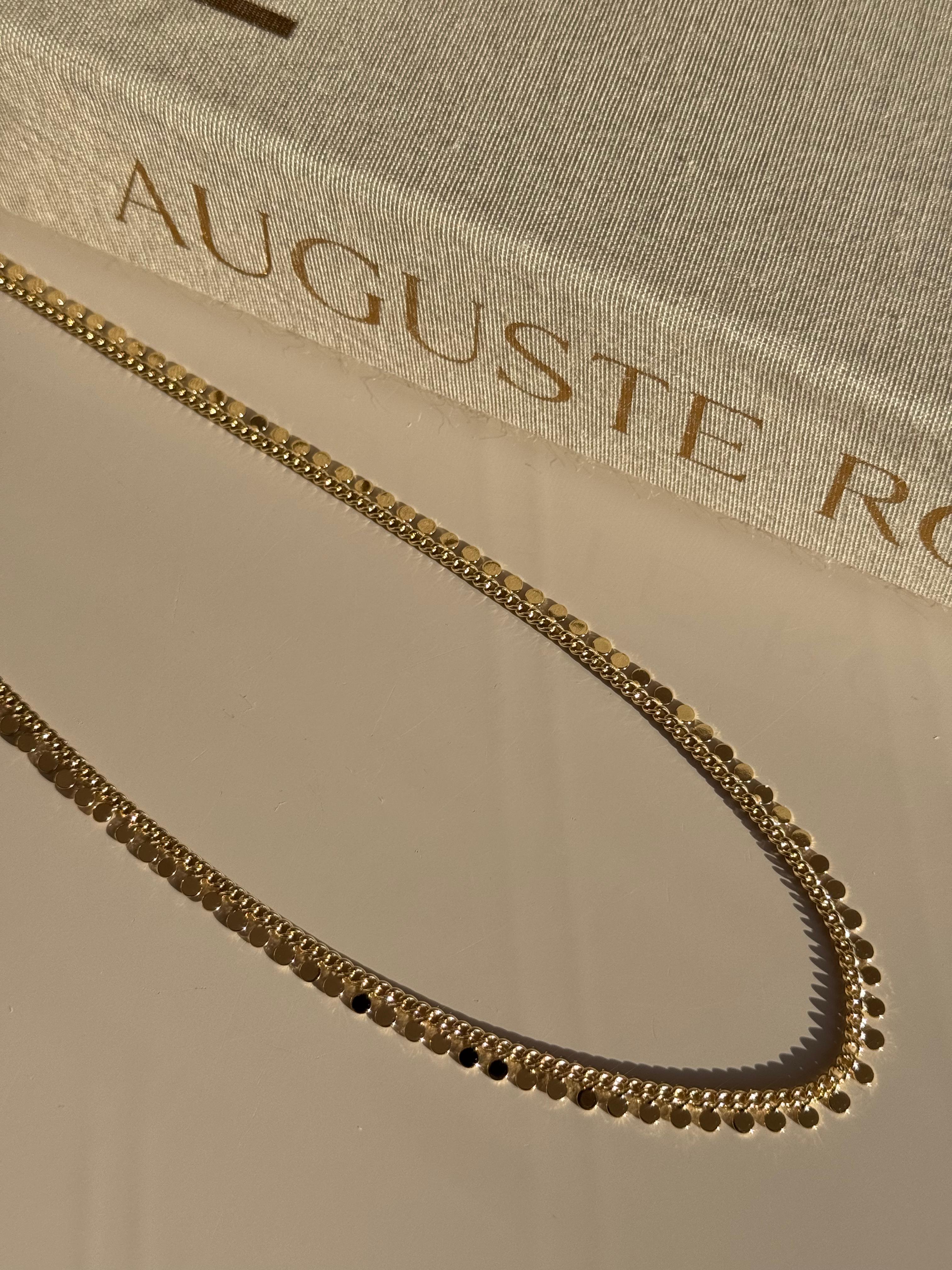 Altın Renk Yuvarlak Form Detaylı Parlak Çelik Kadın Kolye