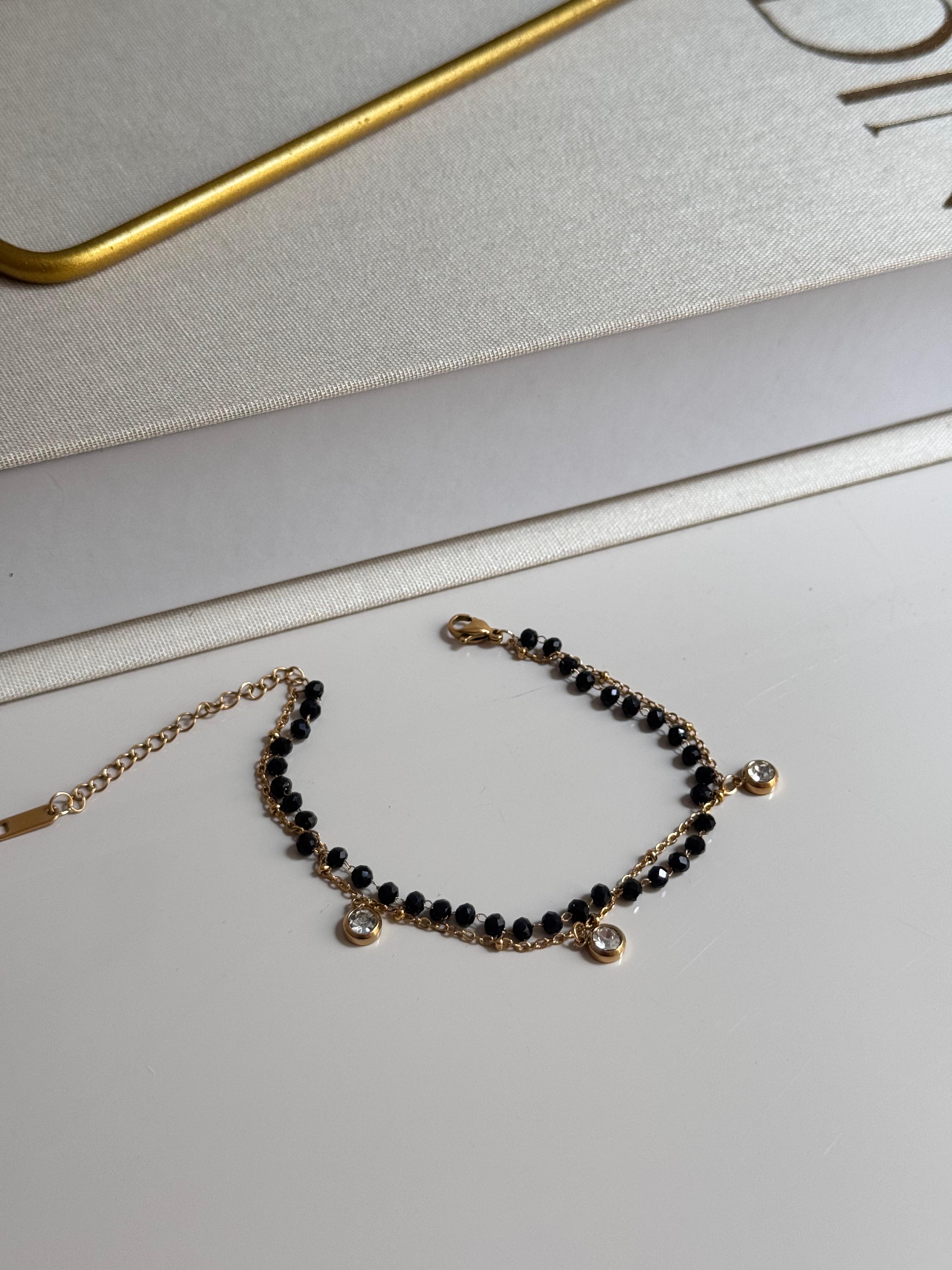 Gold Dangling Black Bead Bracelet