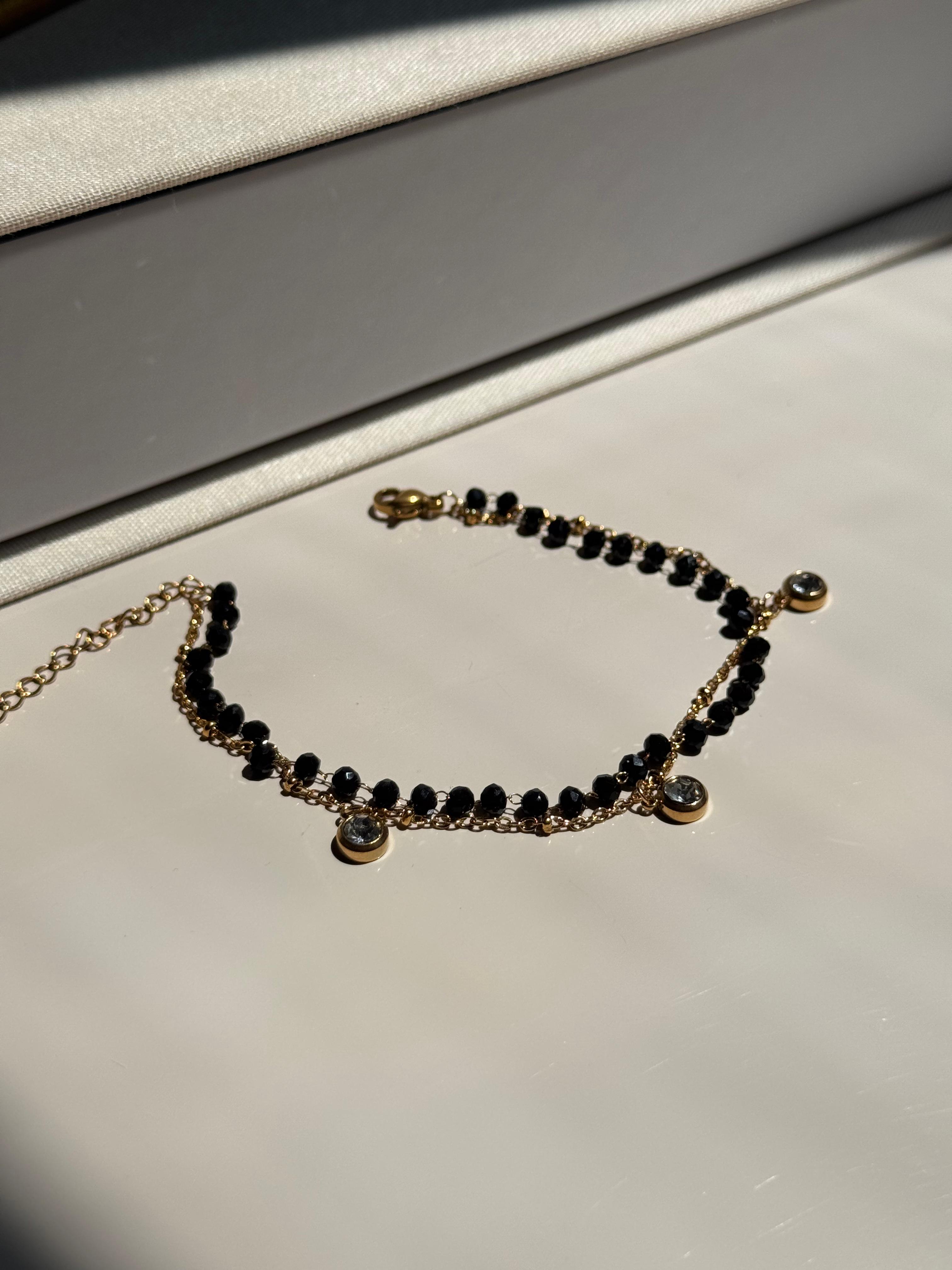 Gold Dangling Black Bead Bracelet