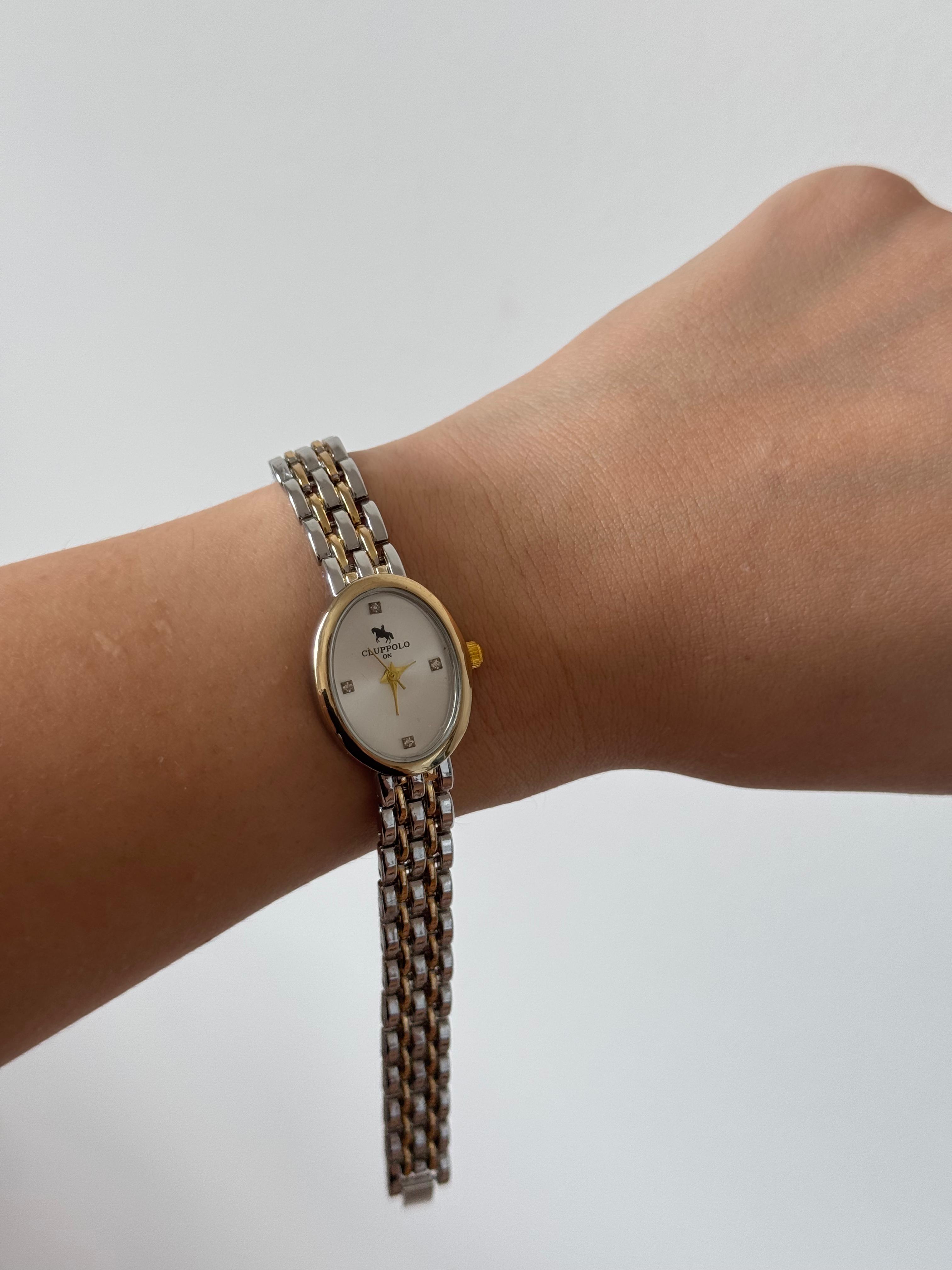 Rose Gold Oval Kasa Beyaz Kadran Zincir Bilezikli Çelik Kadın Kol Saati