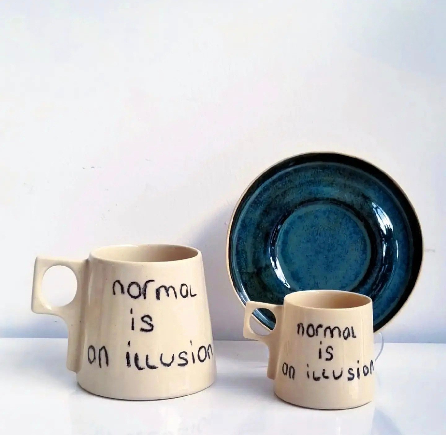 "Normal is an illusion" Stoneware Kupa