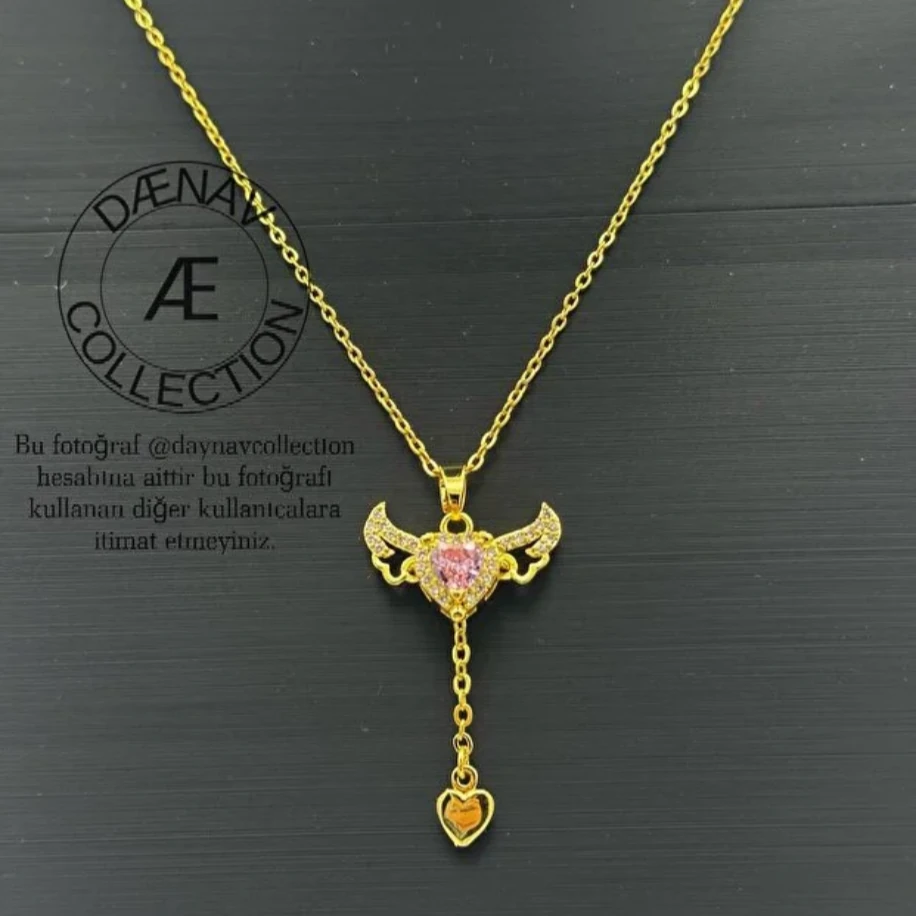 Çelik Altın Kristal Pembe Zirkon Taşlı Oynar Melek Kanatlı Kalpli