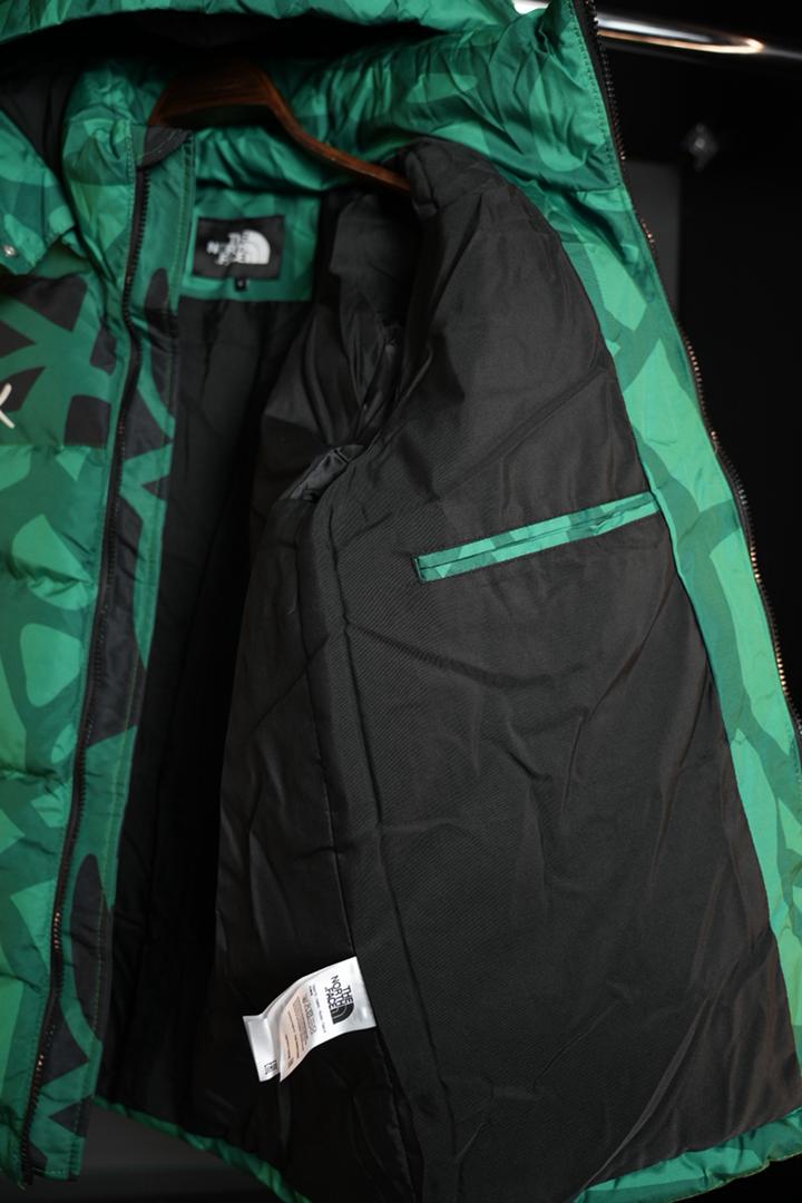 The north face x kaws mont