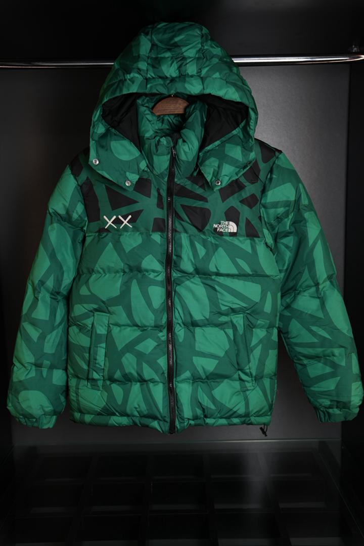 The north face x kaws mont