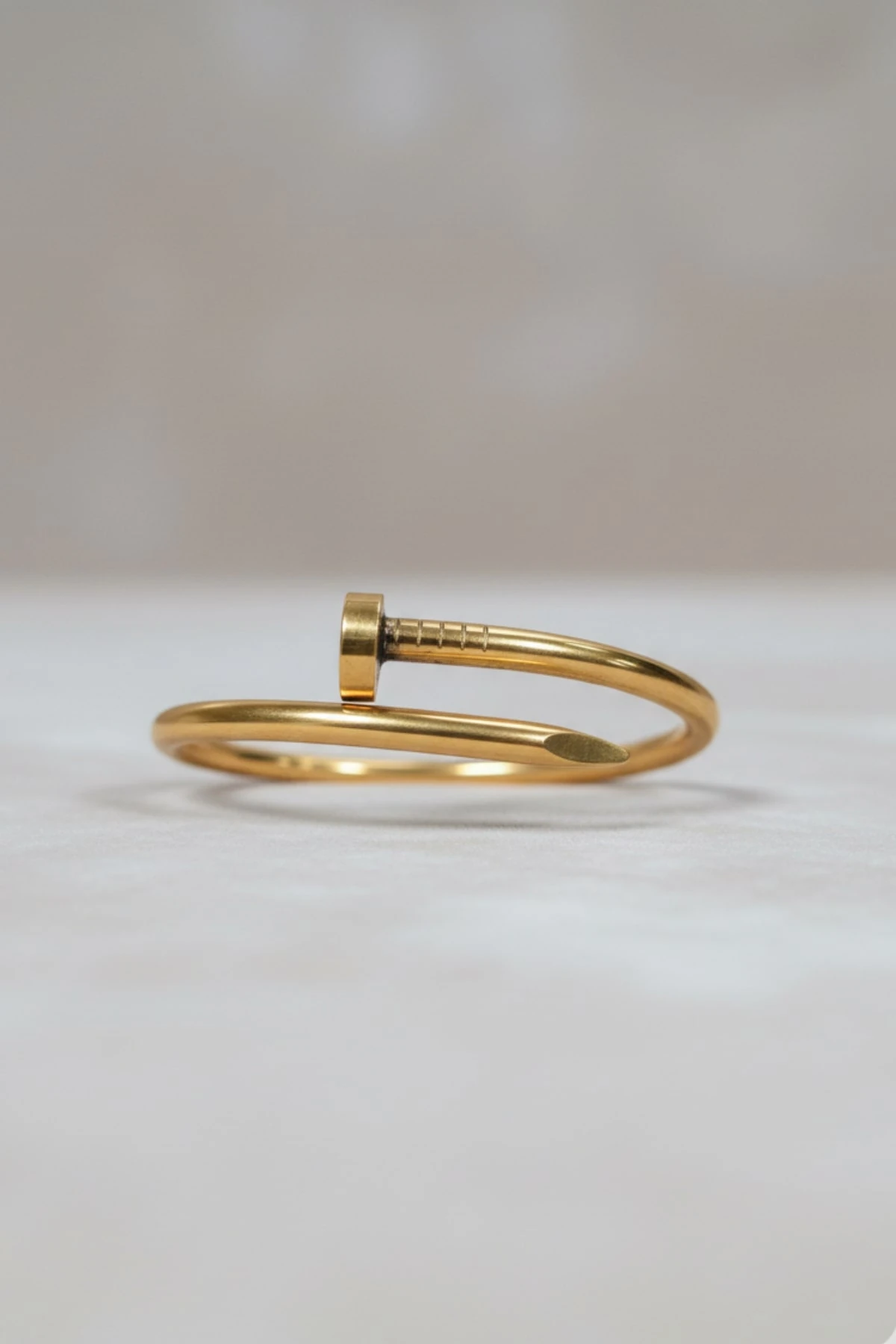 ÇELİK TAŞSIZ ÇİVİLİ KELEPÇE BİLEKLİK	CVL-BLK-GLD