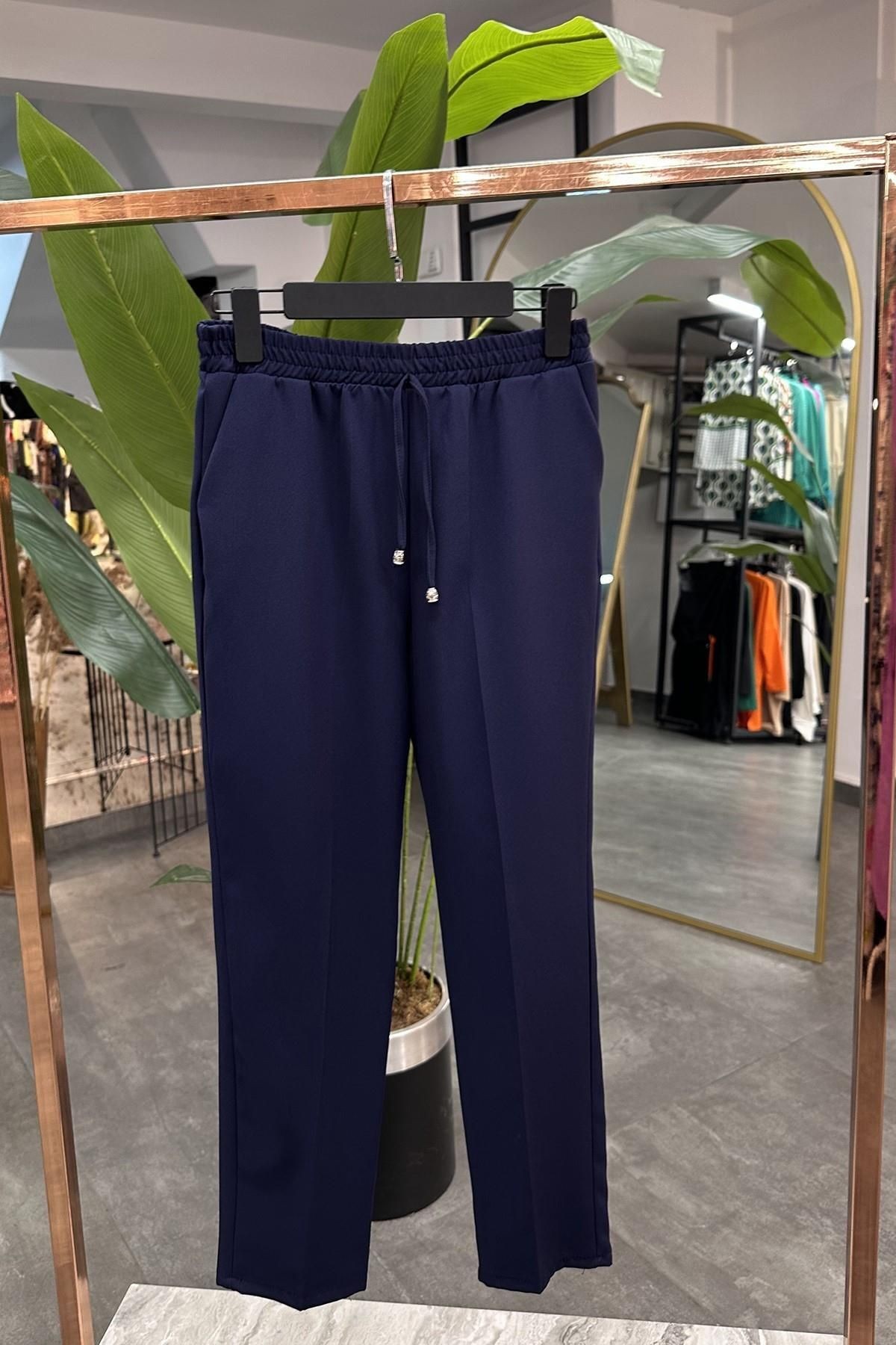 Kadın  Beli Lastikli, Yandan Cepli, Havuç Kesim, Dar Paça Pantolon