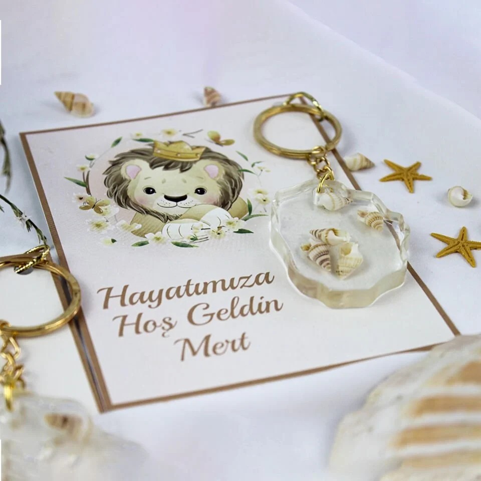 Aslan Temalı Deniz Kabuğu Süslemeli Hediyelik Bebek Anahtarlığı