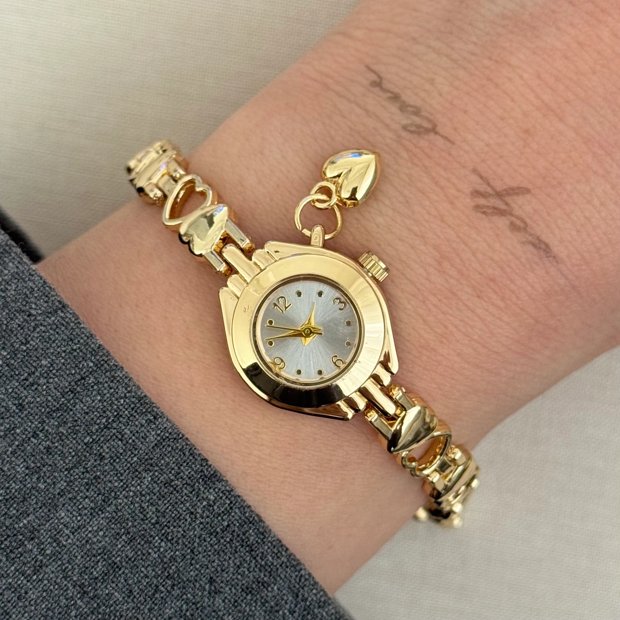 Kalpli kordon Gold - Beyaz saat