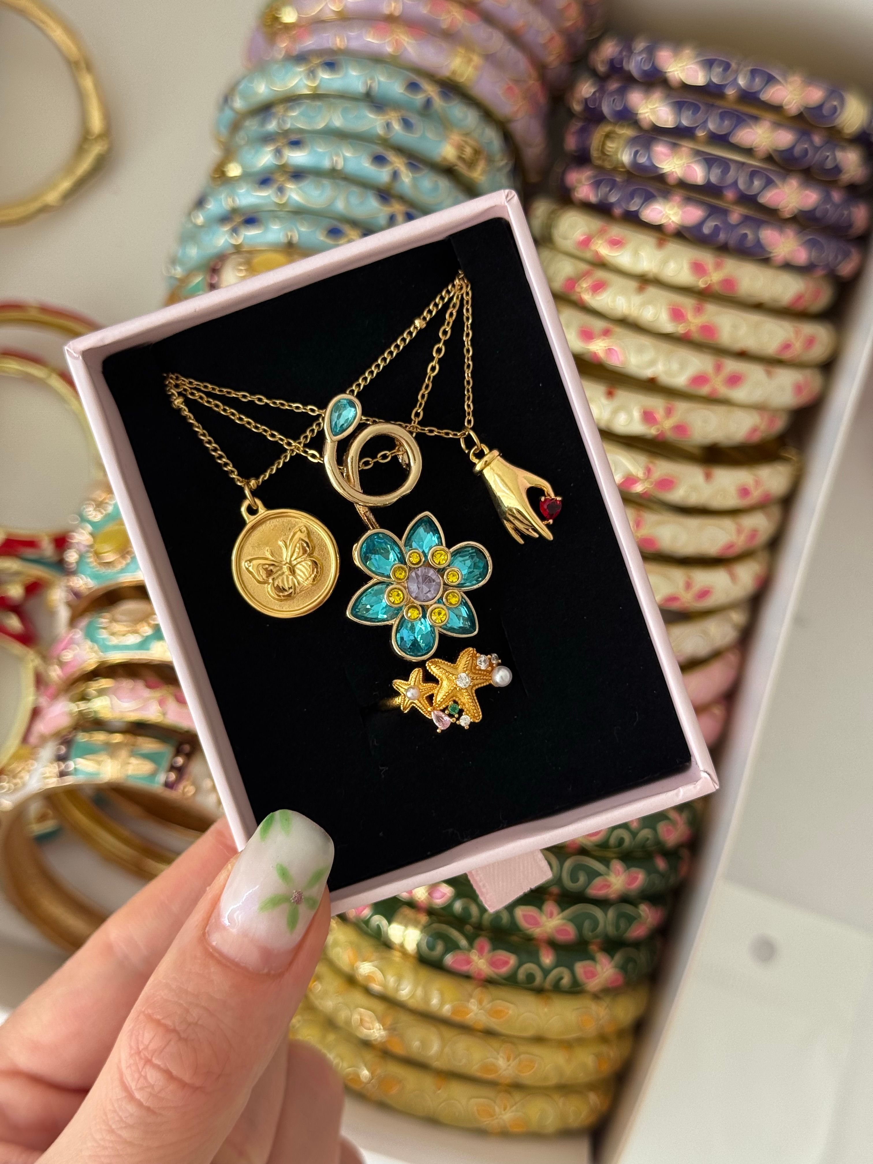 Çelik | Swarovski muadili gold mavi çiçek ldyllia kolye 
