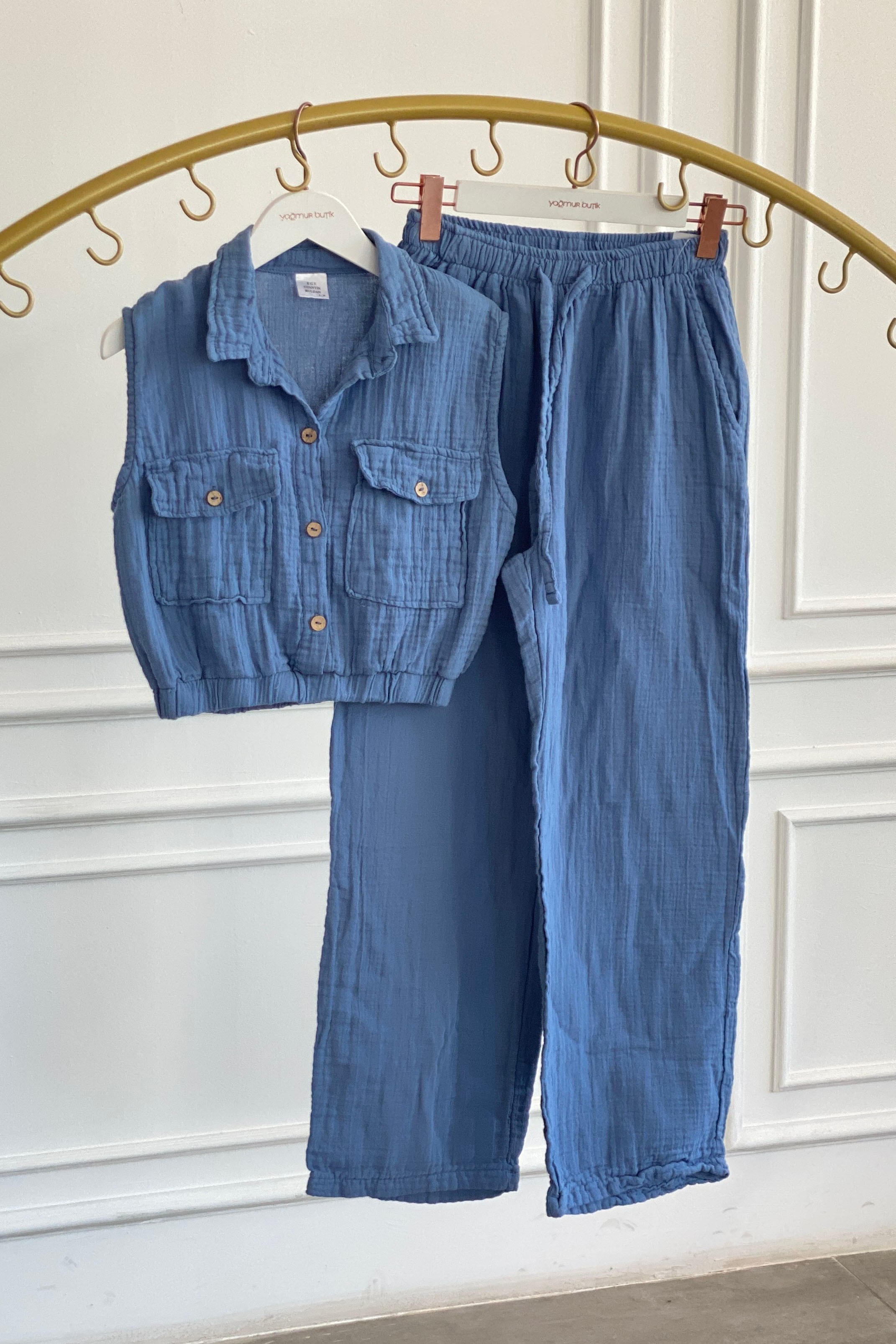 Beli Lastikli Cep Detaylı Kolsuz Müslin Bluz - INDIGO