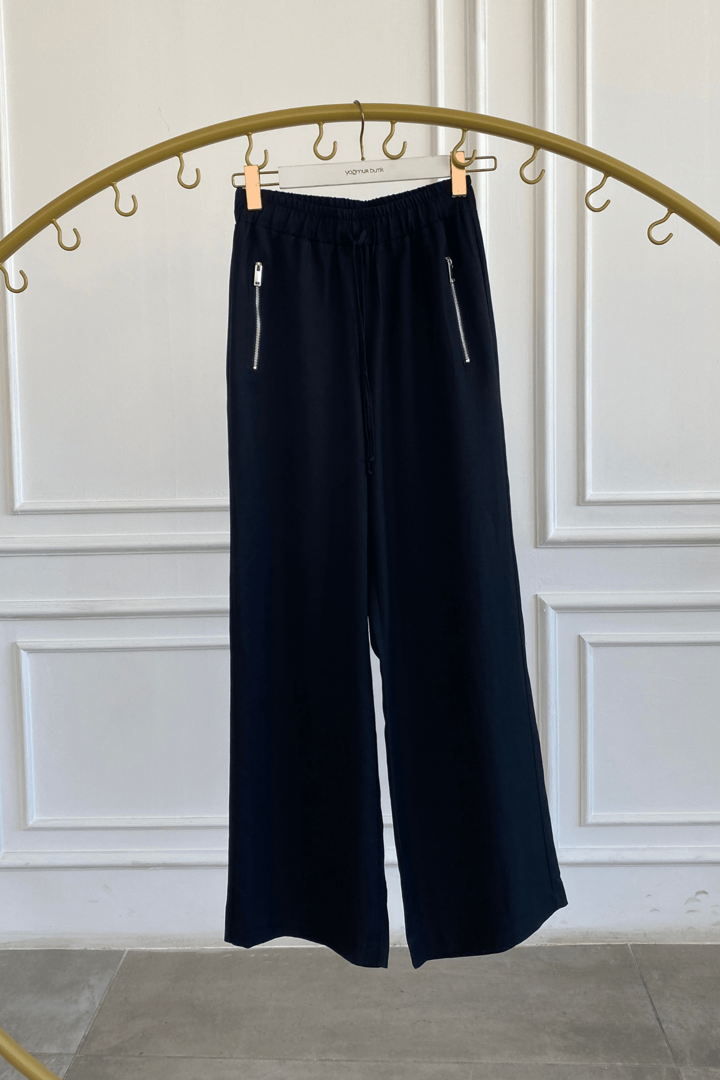 Beli Lastikli Cepleri Fermuar Detaylı Bol Paça Pantolon