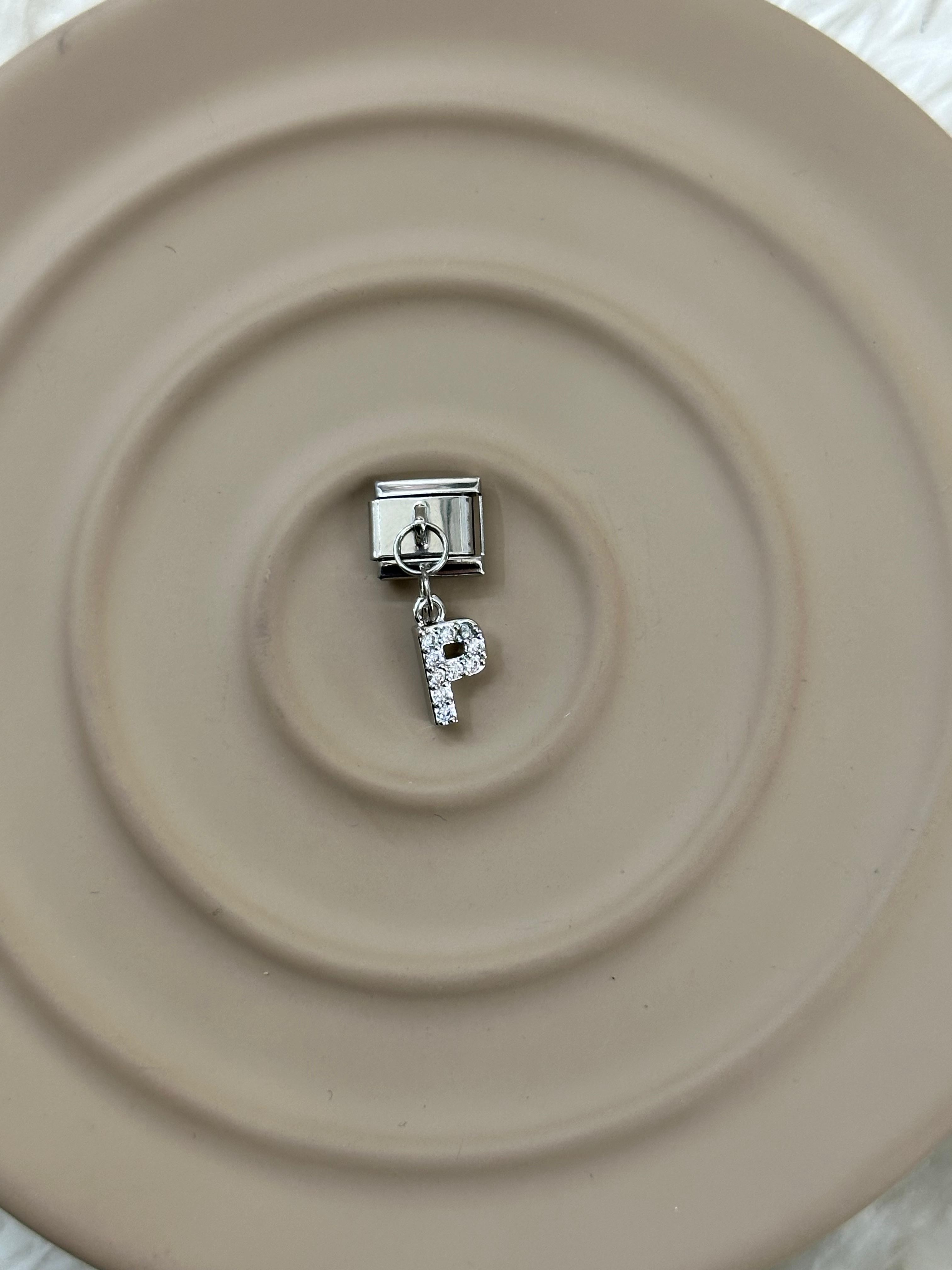 P Harfli Nomination Charm