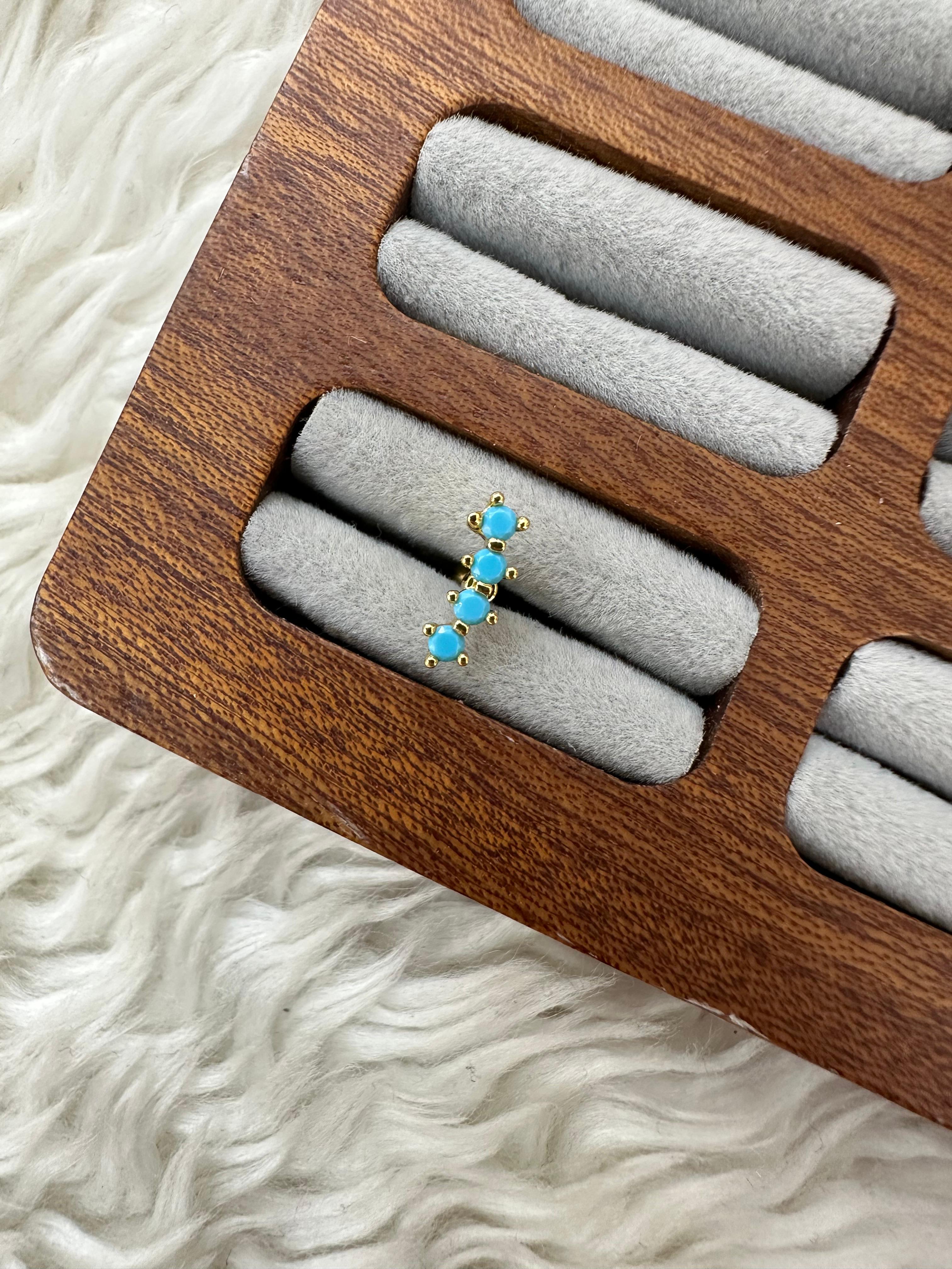 🔗 Mavi Sıralı Dört Top Piercing