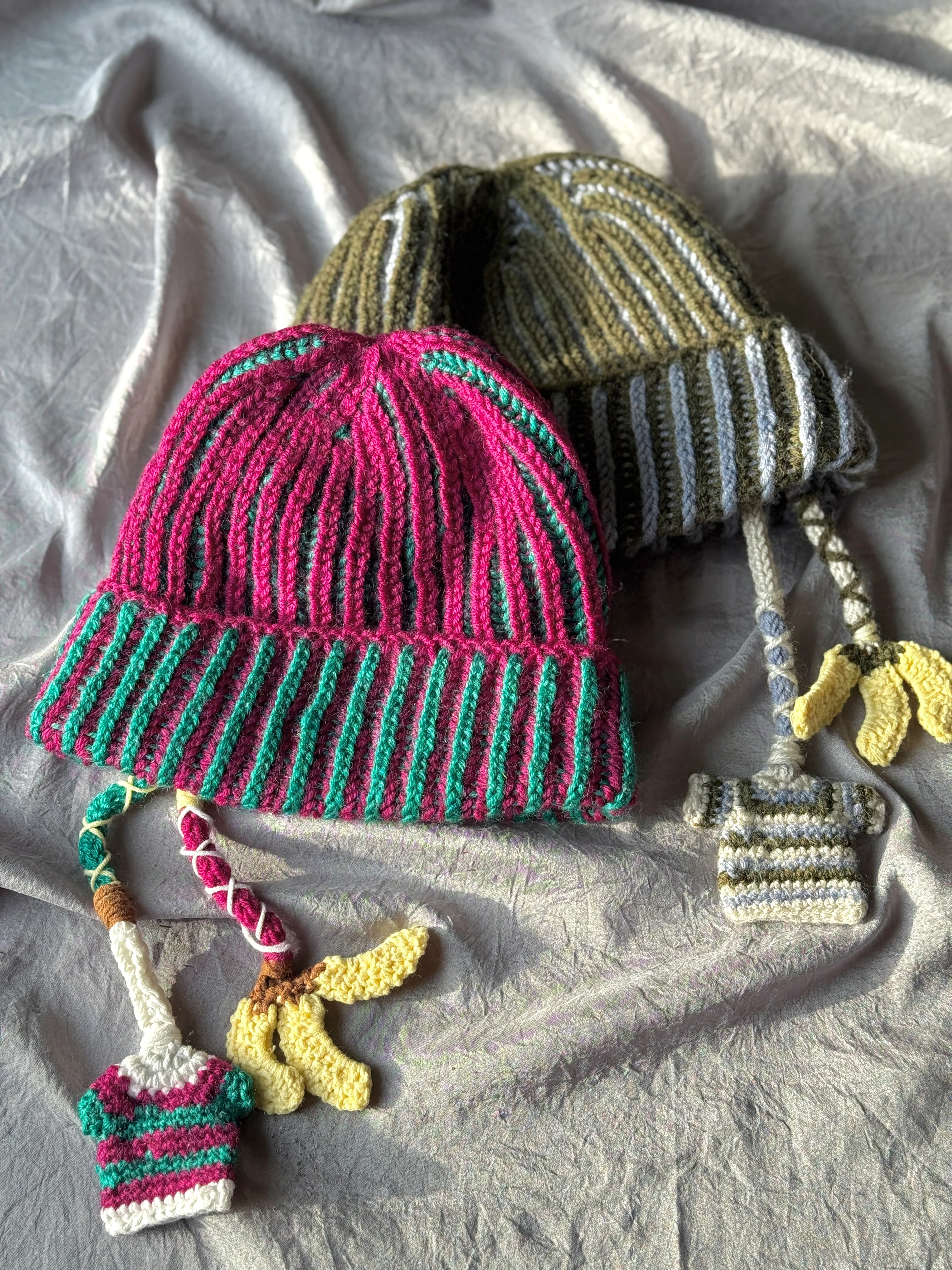 hand-knit striped charm beanie