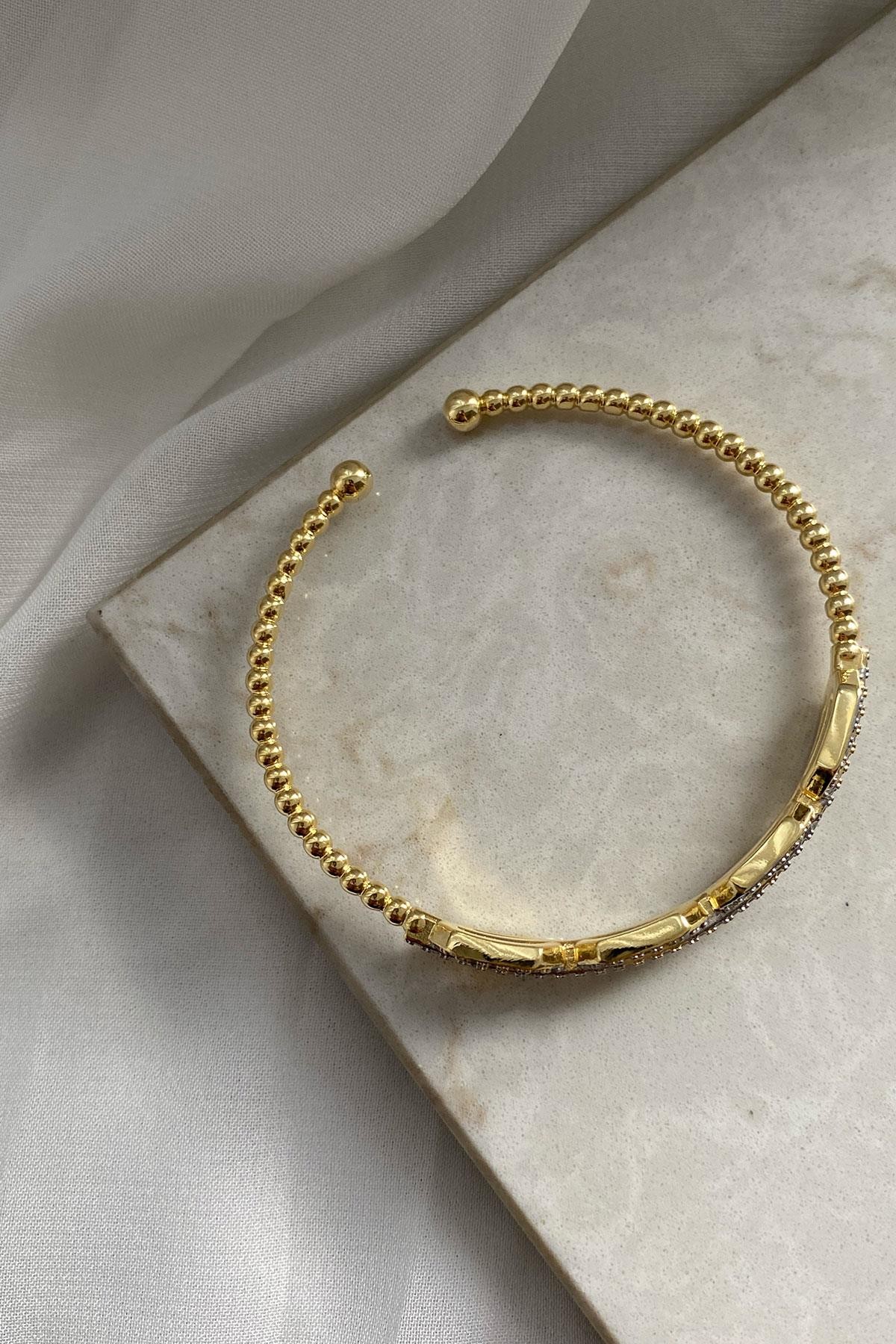 Beyaz Taşlı Yuvarlak Model Gold Detaylı Kelepçe Bileklik