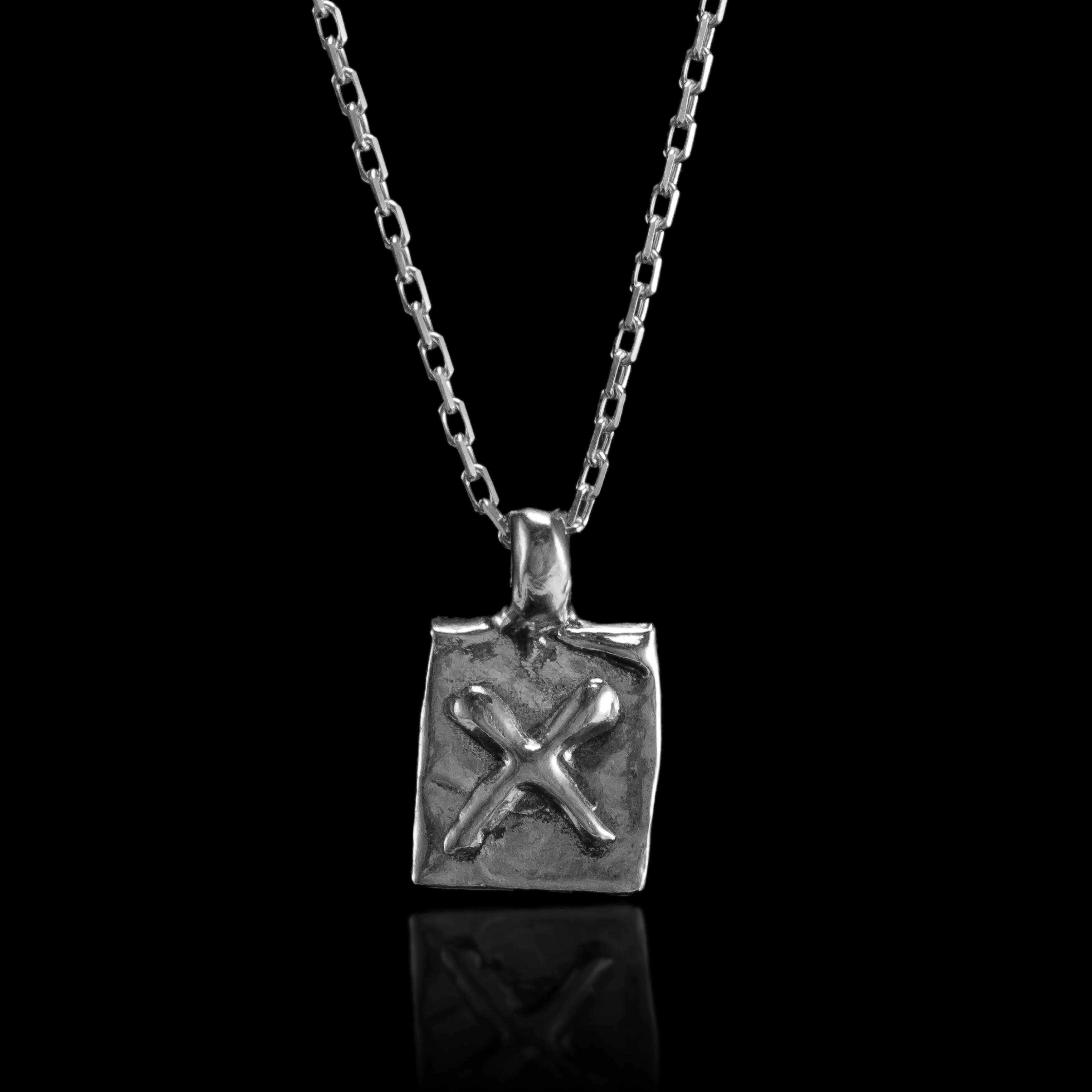 THE ELEMENTAL CROSS NECKLACE 