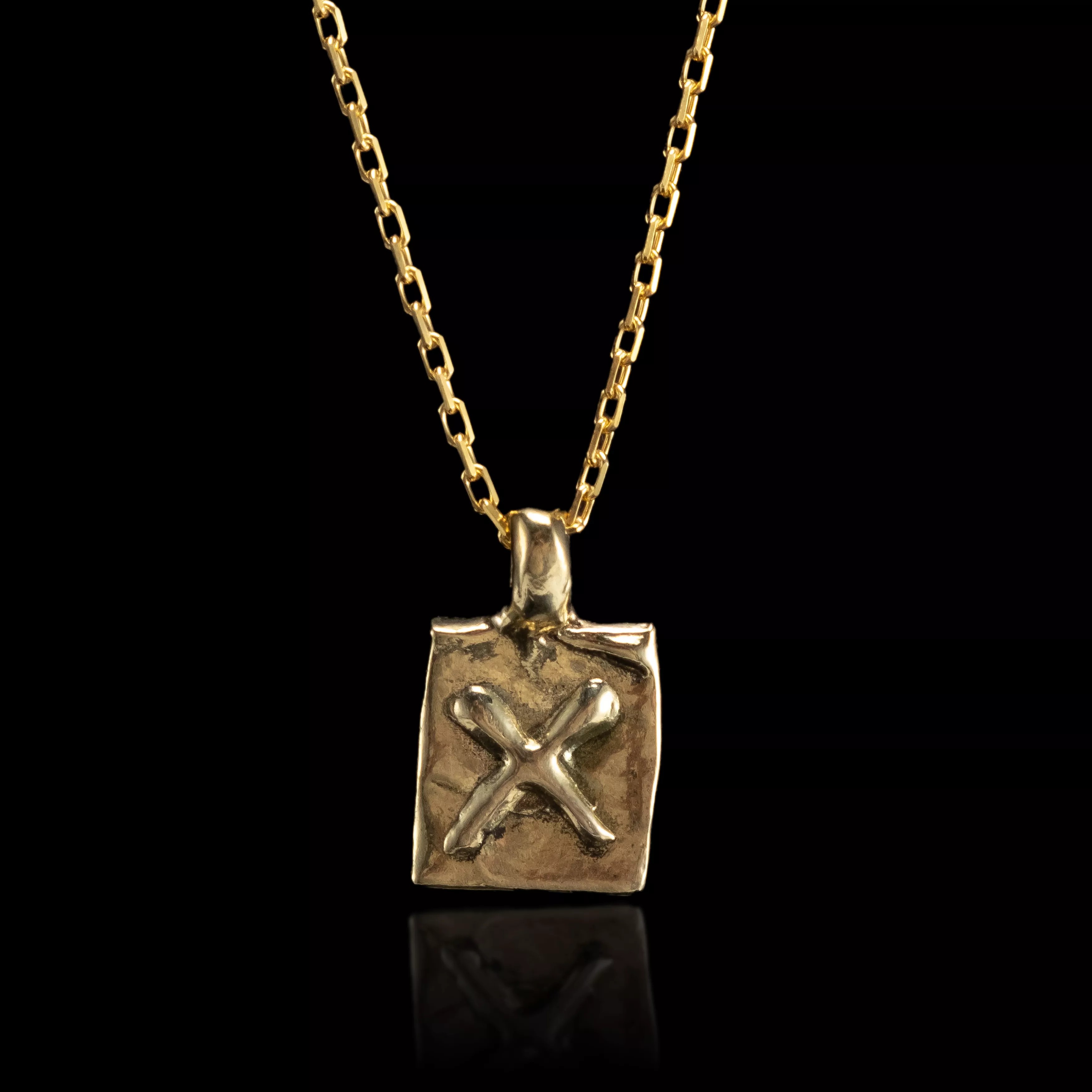 THE ELEMENTAL CROSS NECKLACE