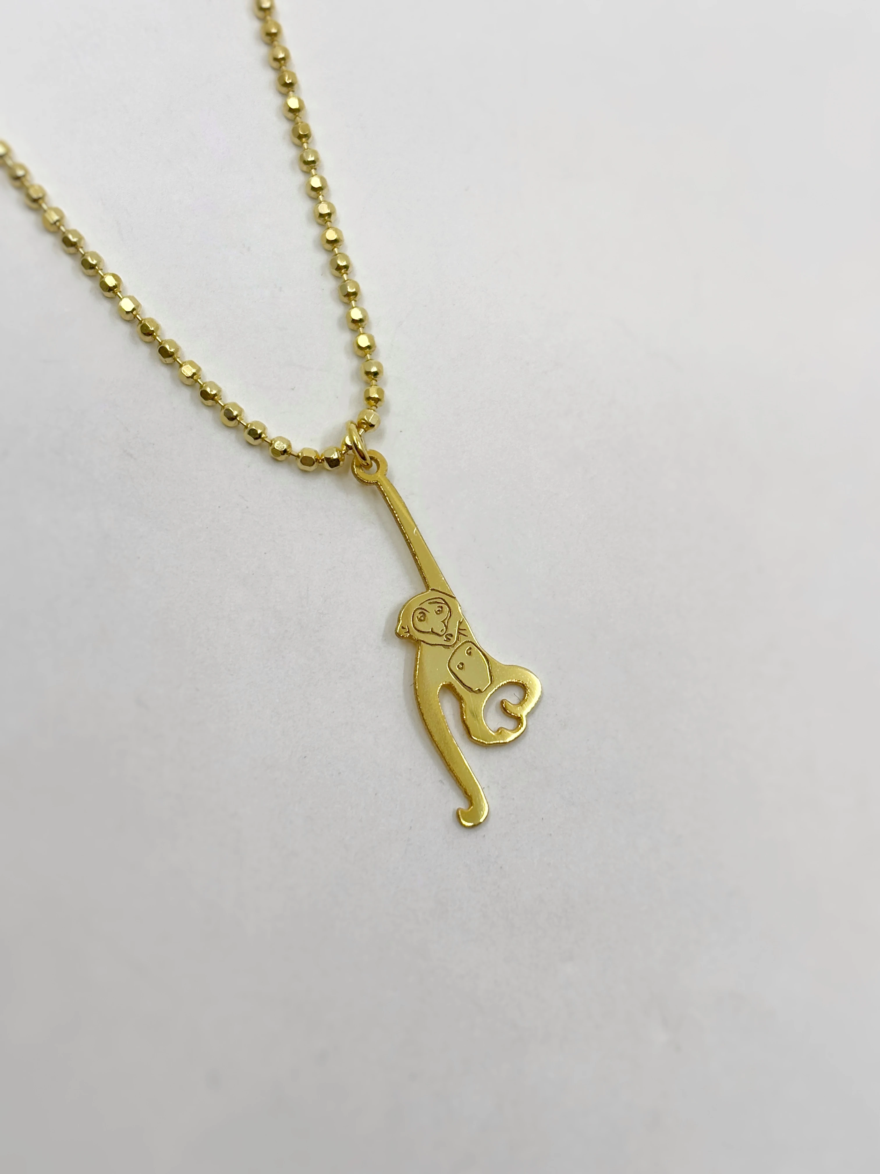 Chimp Necklace