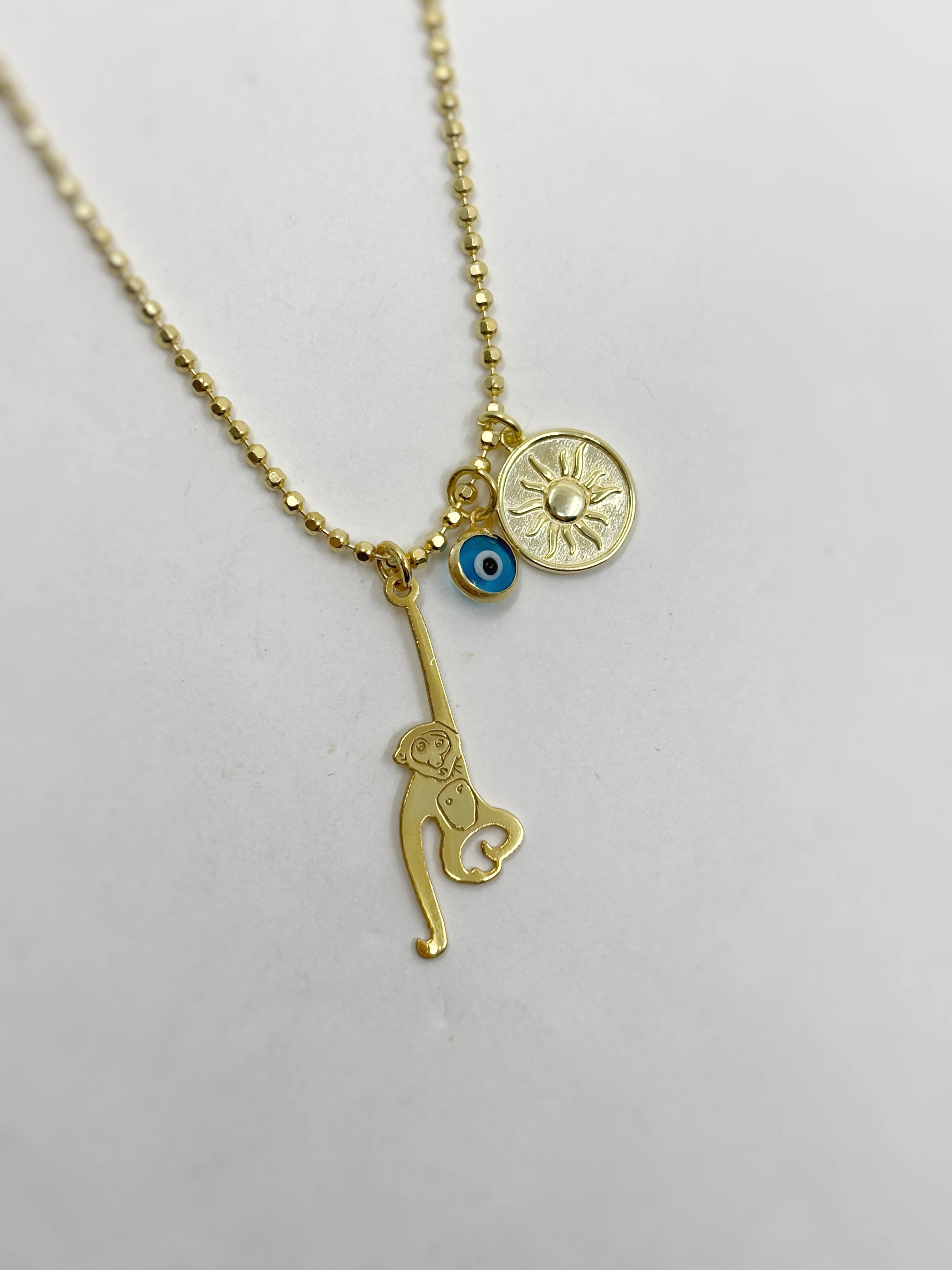 Chimp and Evil Eye Necklace