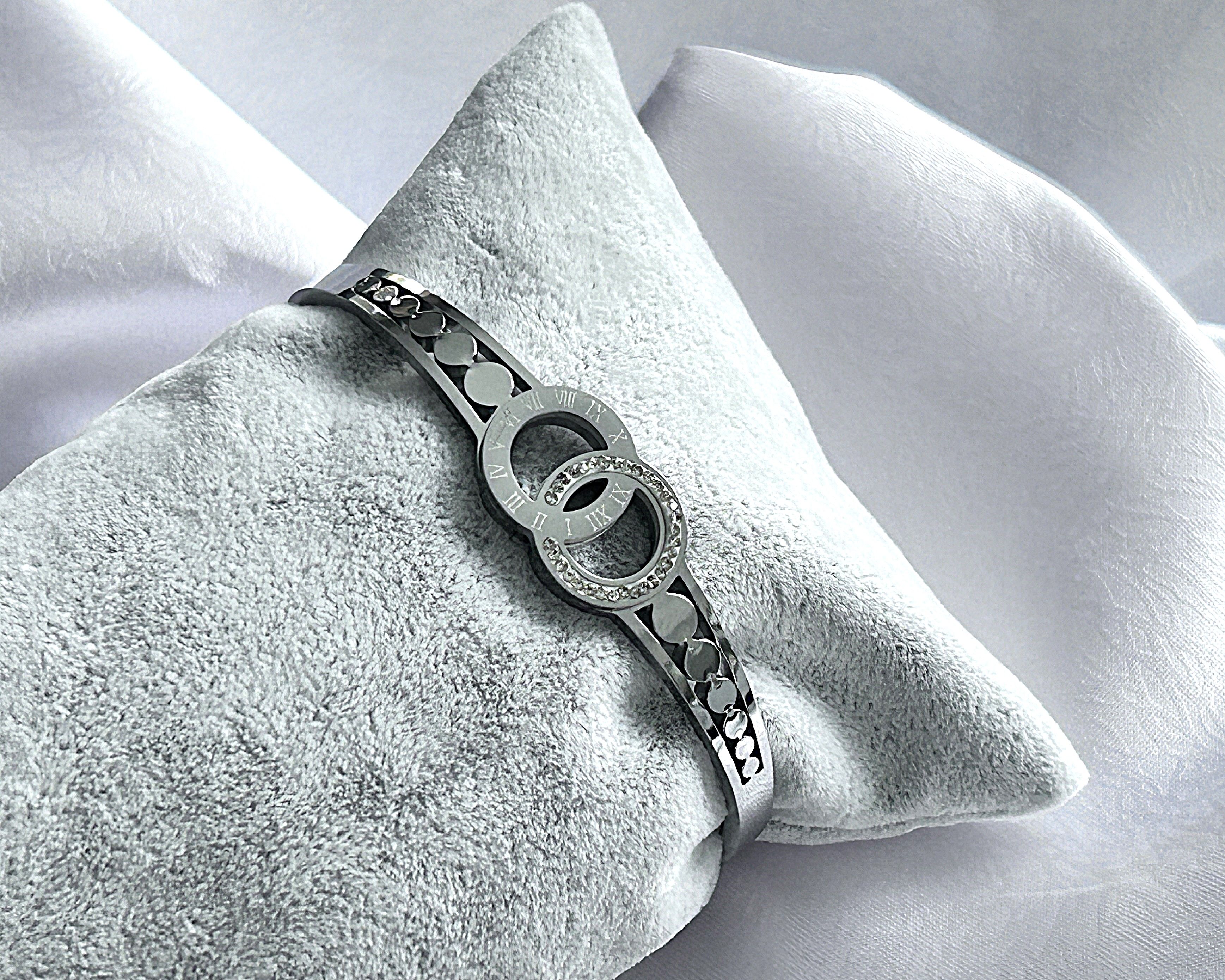 ATA İç İçe Halka Roma Rakamlı Taşlı Kelepçe Bileklik Silver Design