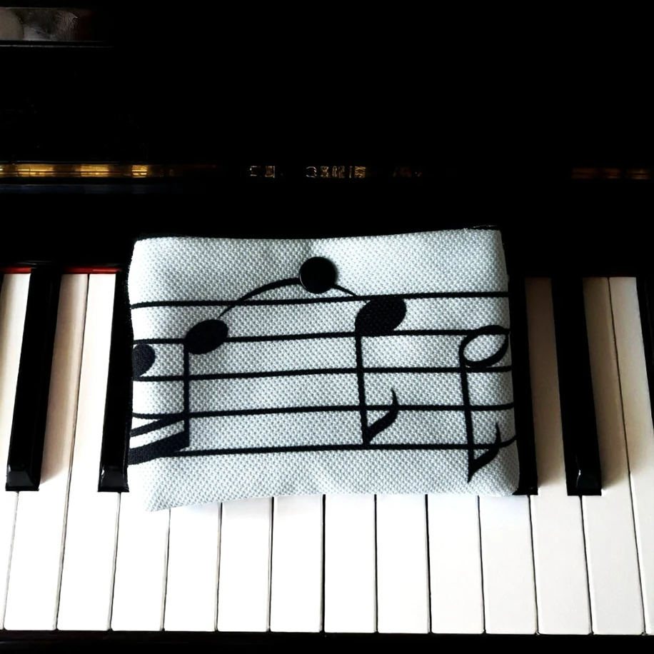 Nota Desenli Çıtçıtlı Mini Çanta