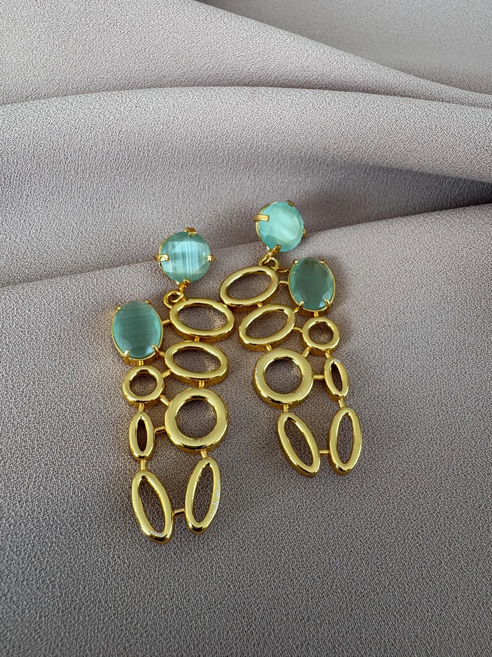 Kedi Gözü Uzun Döküm Küpeler