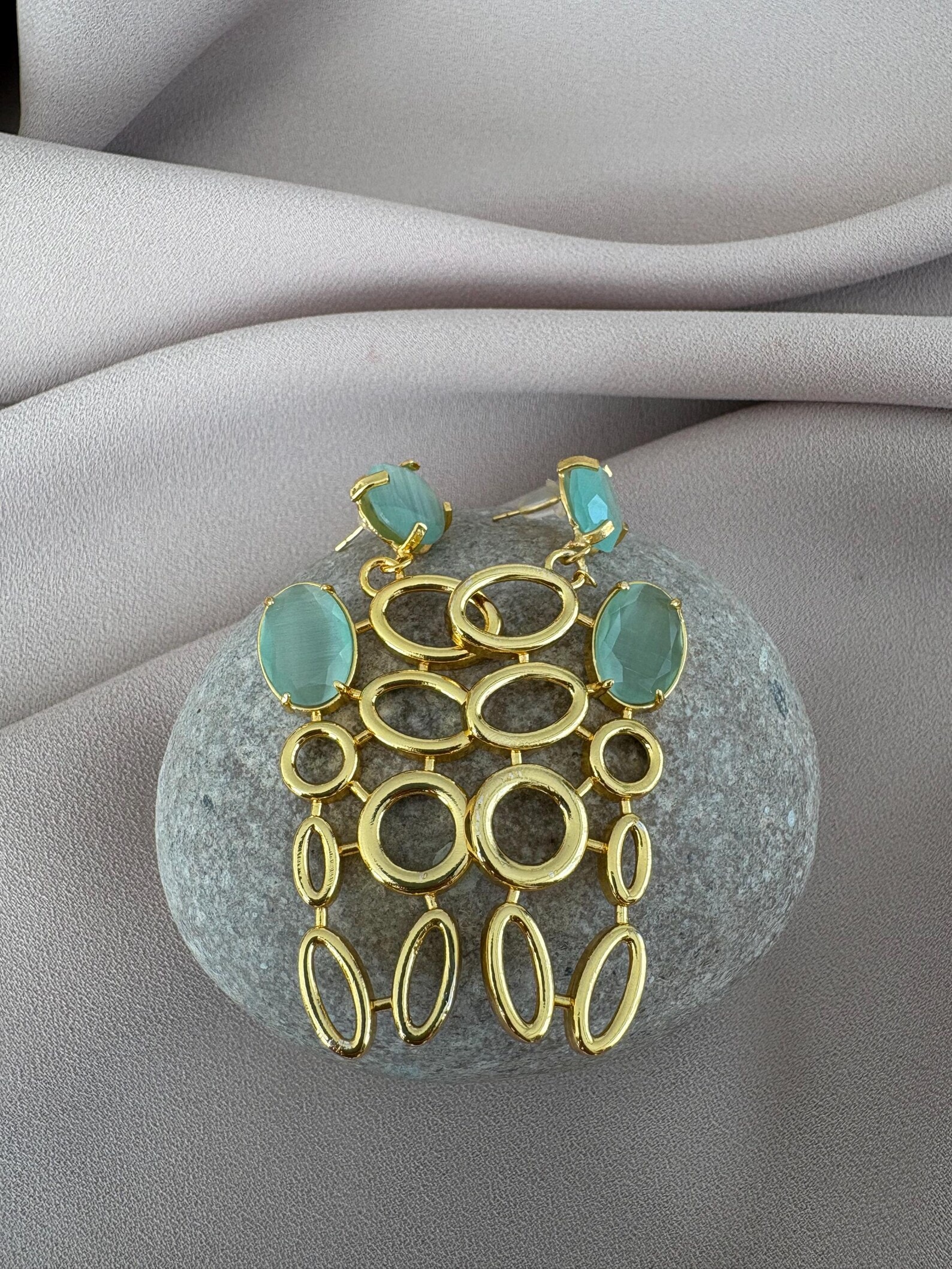 Kedi Gözü Uzun Döküm Küpeler