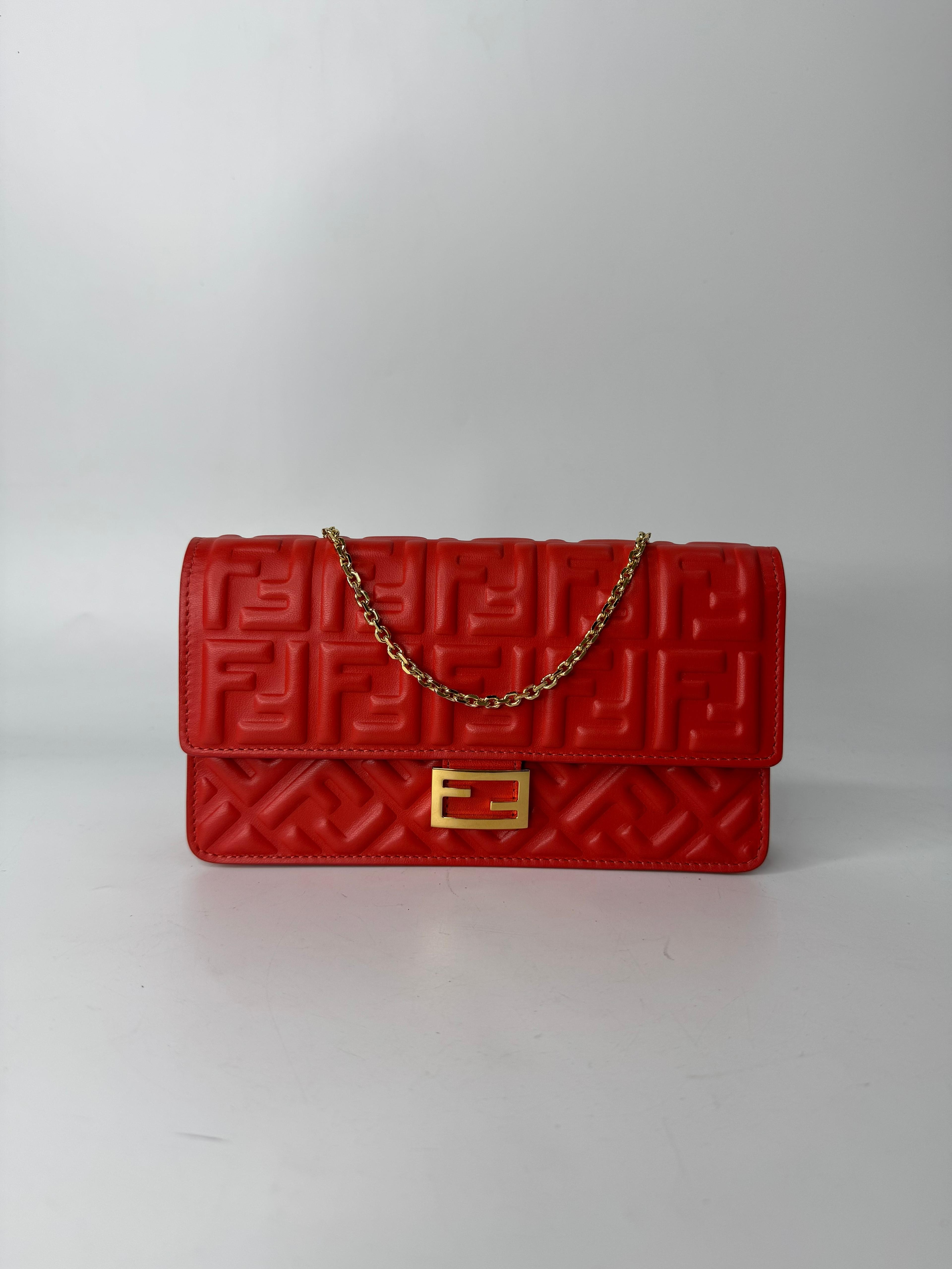 FENDI  BAGUETTE FF-EMBOSSED CLUTCH BAG