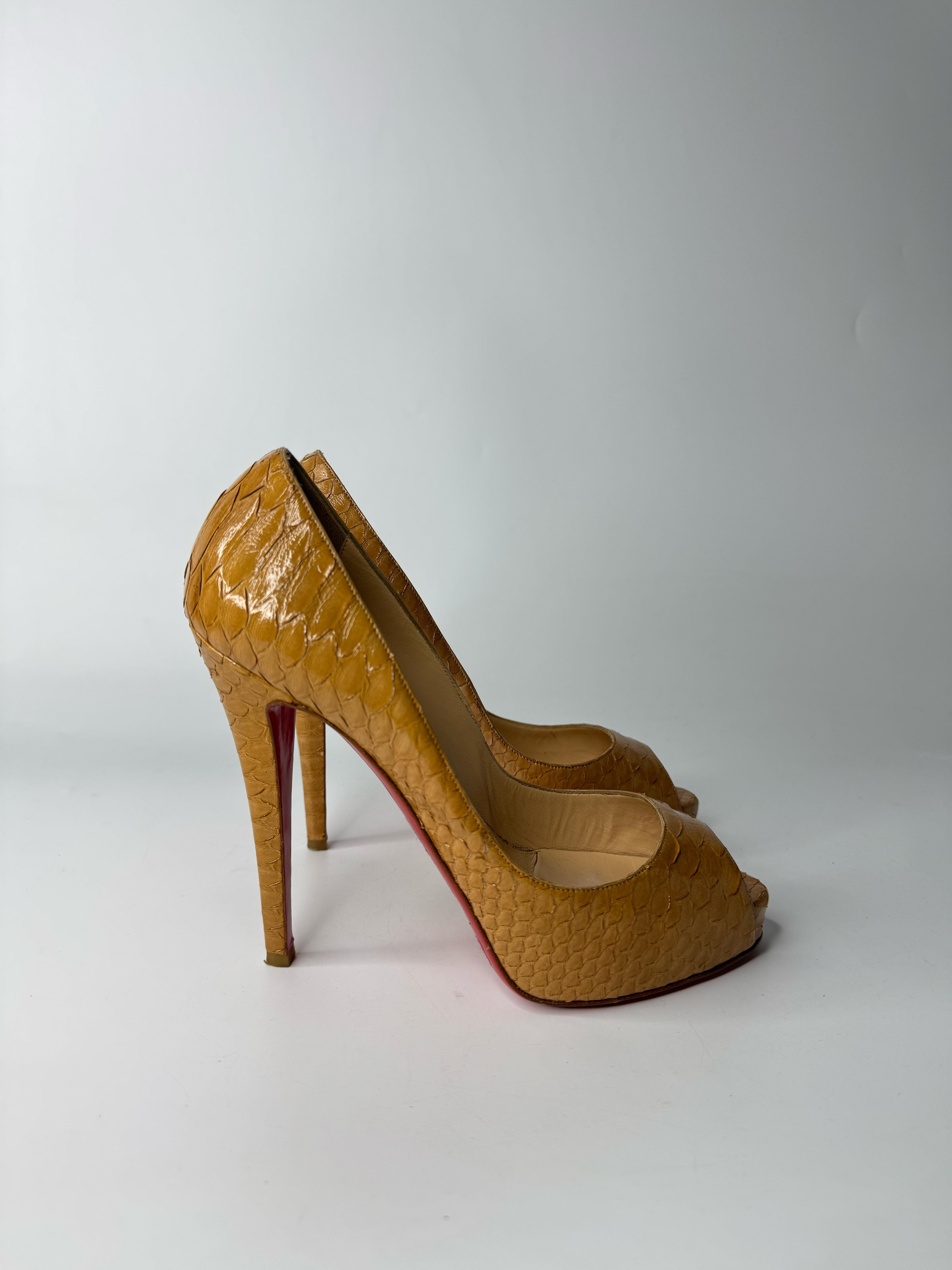 CHRISTIAN LOUBOUTIN PYTHON LEATHER