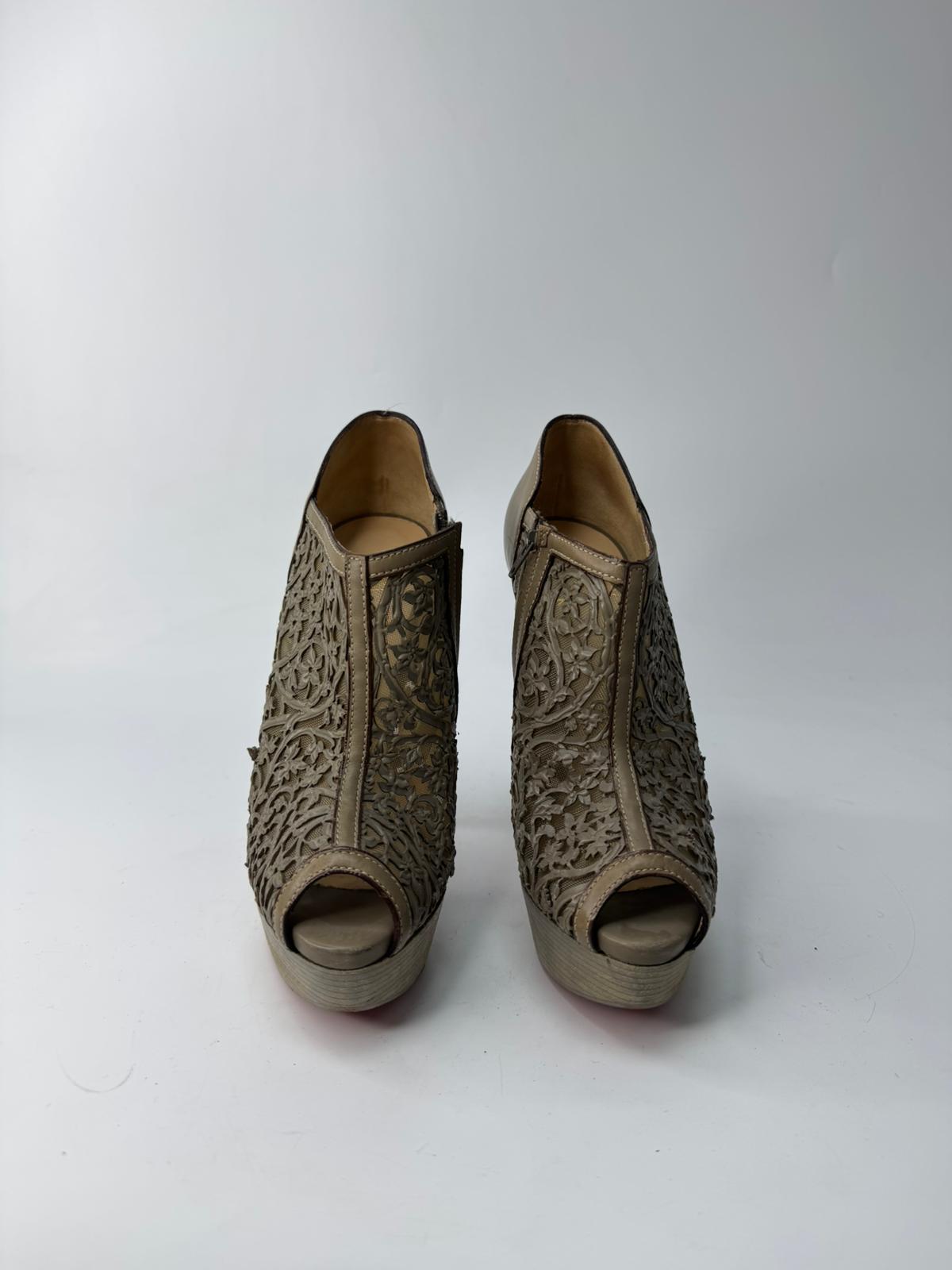 CHRISTIAN LOUBOUTIN HEELS