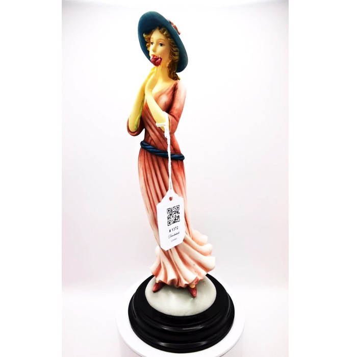 The Leonardo Collection Pink Dress, Blue Hat, and Flower Holding Lady Figurine: A Perfect Blend of Elegance and Natural Beauty