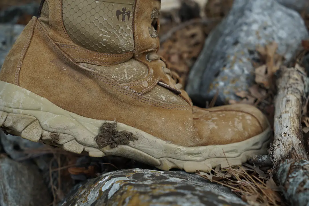 Secure steps on rocky and muddy terrain: deep lugged rubber outsoles provide grip and stability on slippery surfaces.
