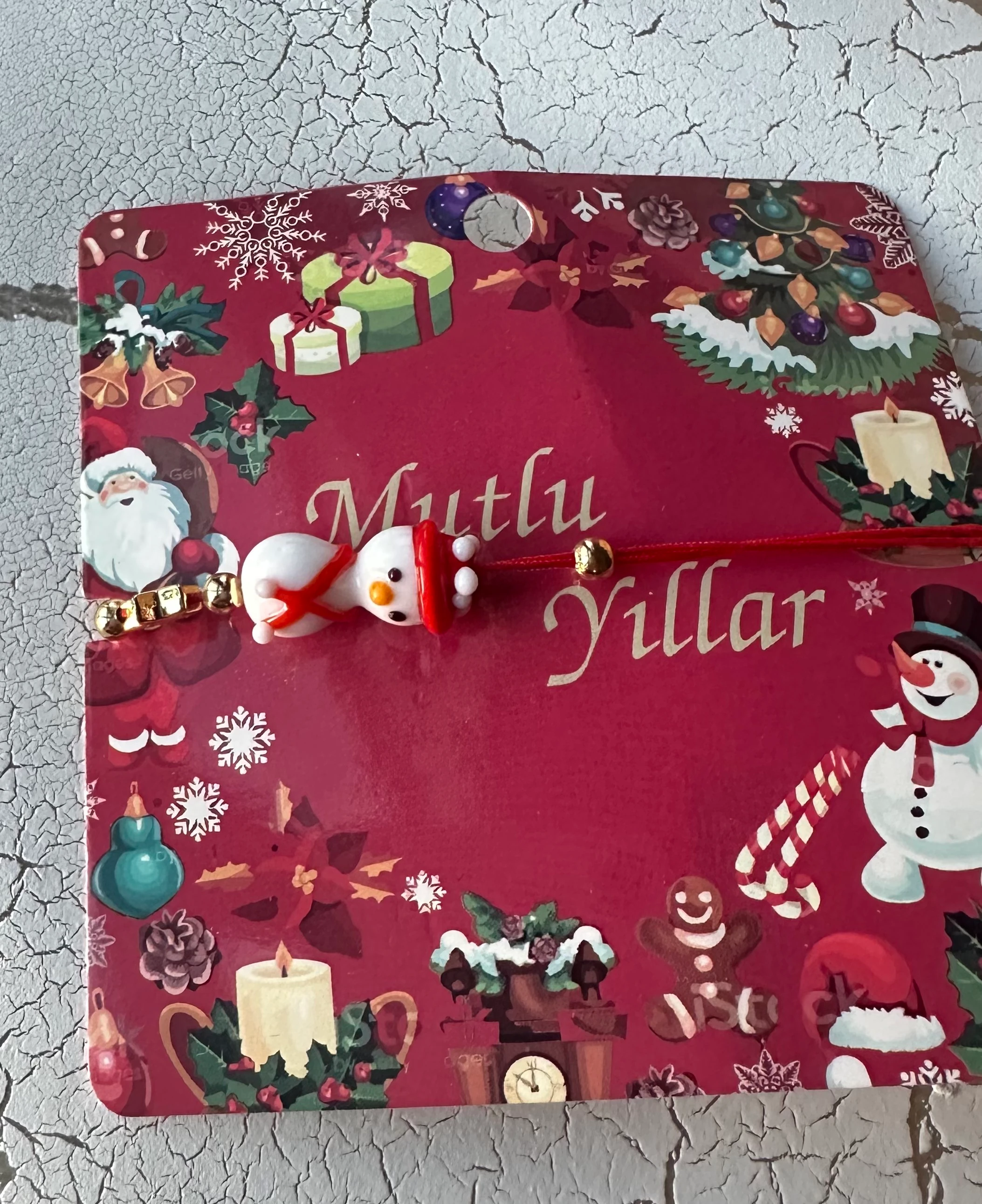 illys Beyaz Cam Kardan Adam Figür Kırmızı İp Yılbaşı Bilekliği