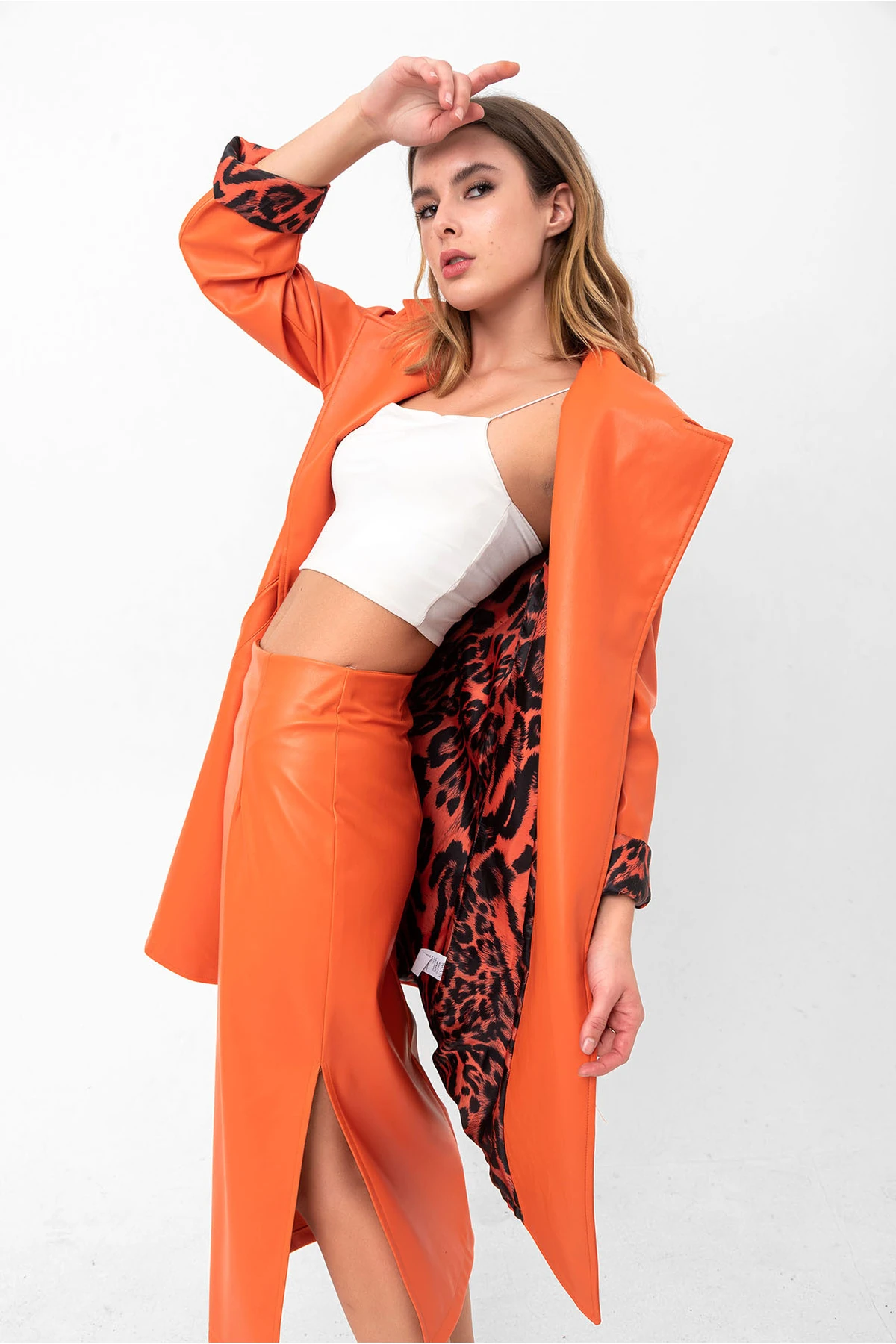 Yırtmaç Detaylı Midi Suni Deri Etek