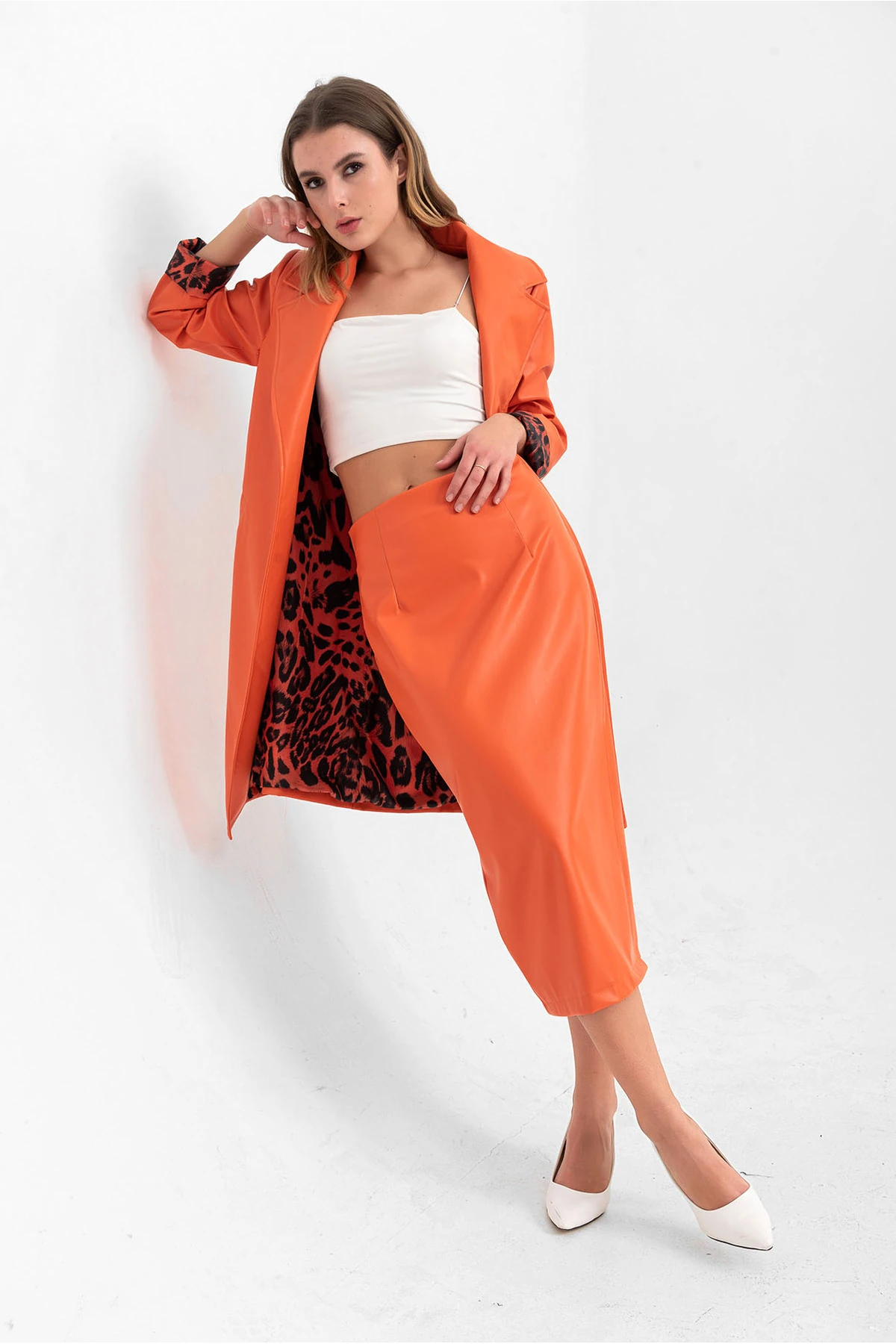 Yırtmaç Detaylı Midi Suni Deri Etek