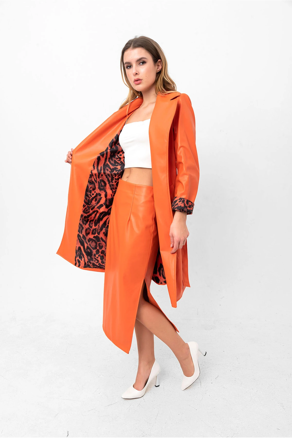 Yırtmaç Detaylı Midi Suni Deri Etek