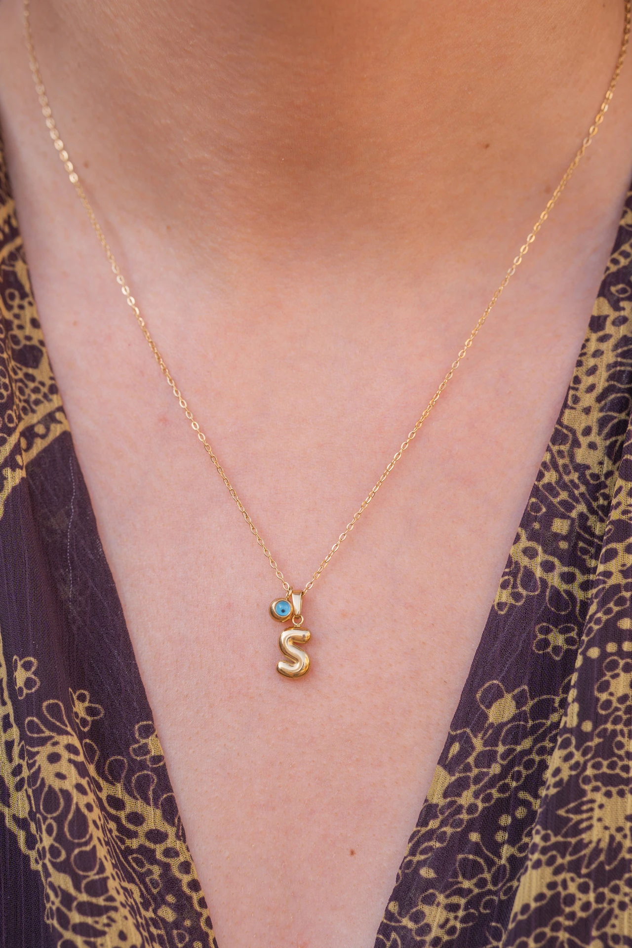 Altın Renkli Nazar Boncuklu S Harfi Kolye