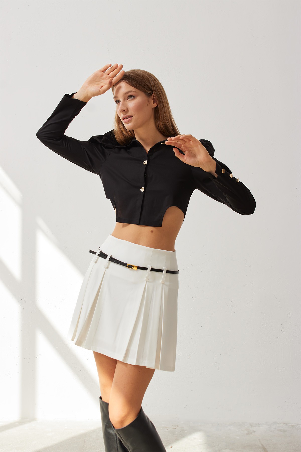 LILIA Pleated White Mini Skirt with Black Belt Detail