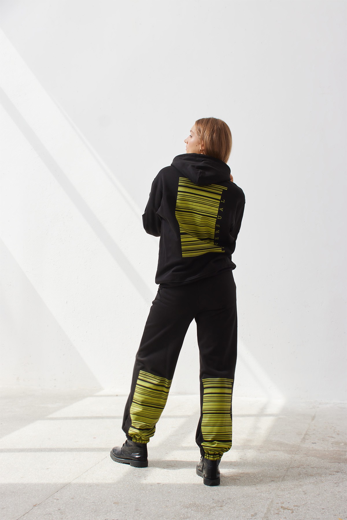 IVORY Black Sweatpants with Green Print on the Back