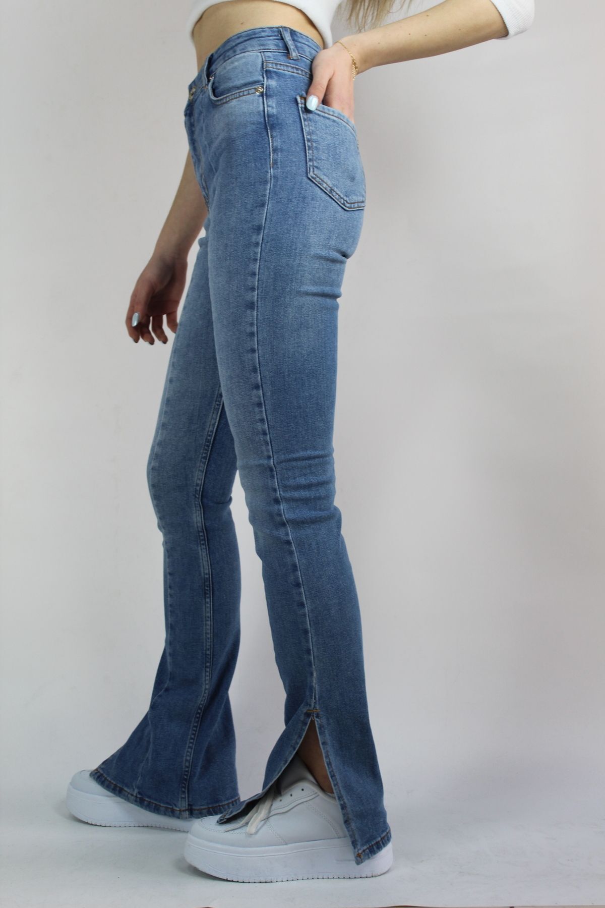 LİKRALI PAÇA YIRTMAÇLI İSPANYOL PAÇA JEANS TOPARLAYICI KAADIN PANTOLON