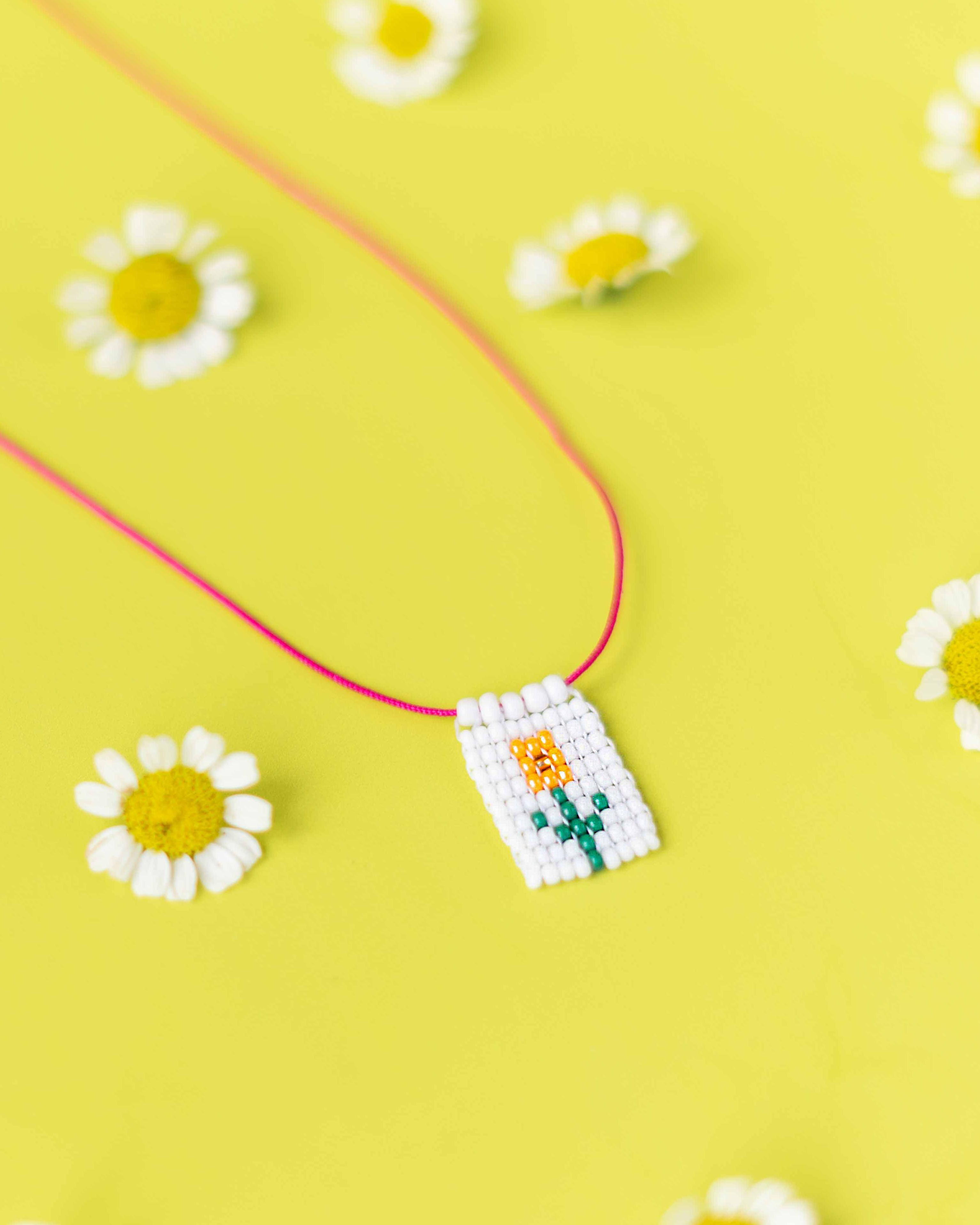 DAISY CHARM NECKLACE 