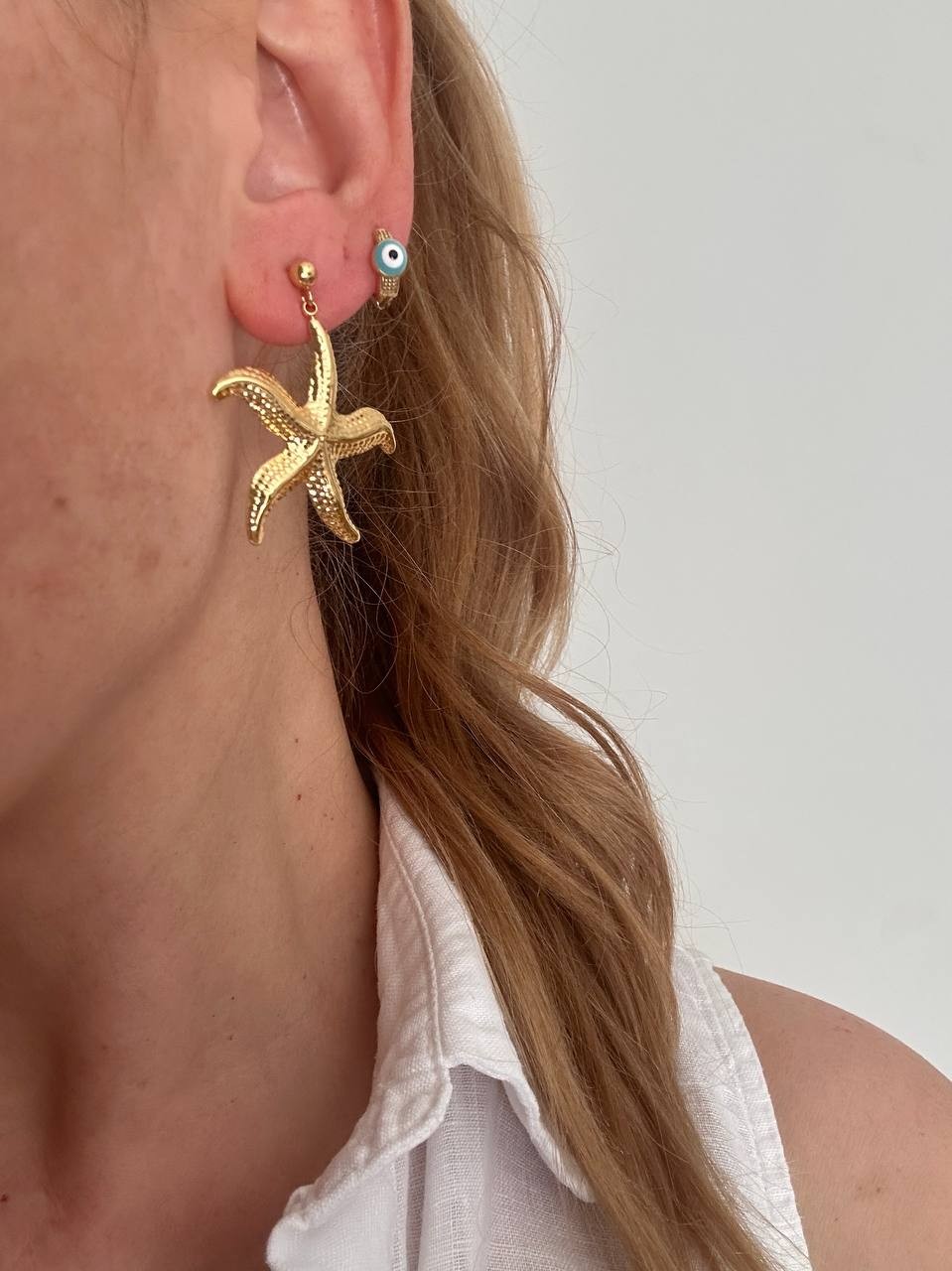 Vip Çelik Gold Renk Lazer Kesim Deniz Yıldızı Sallantılı Küpe Genişlik 3,5 cm. Uzunluk 4 cm.