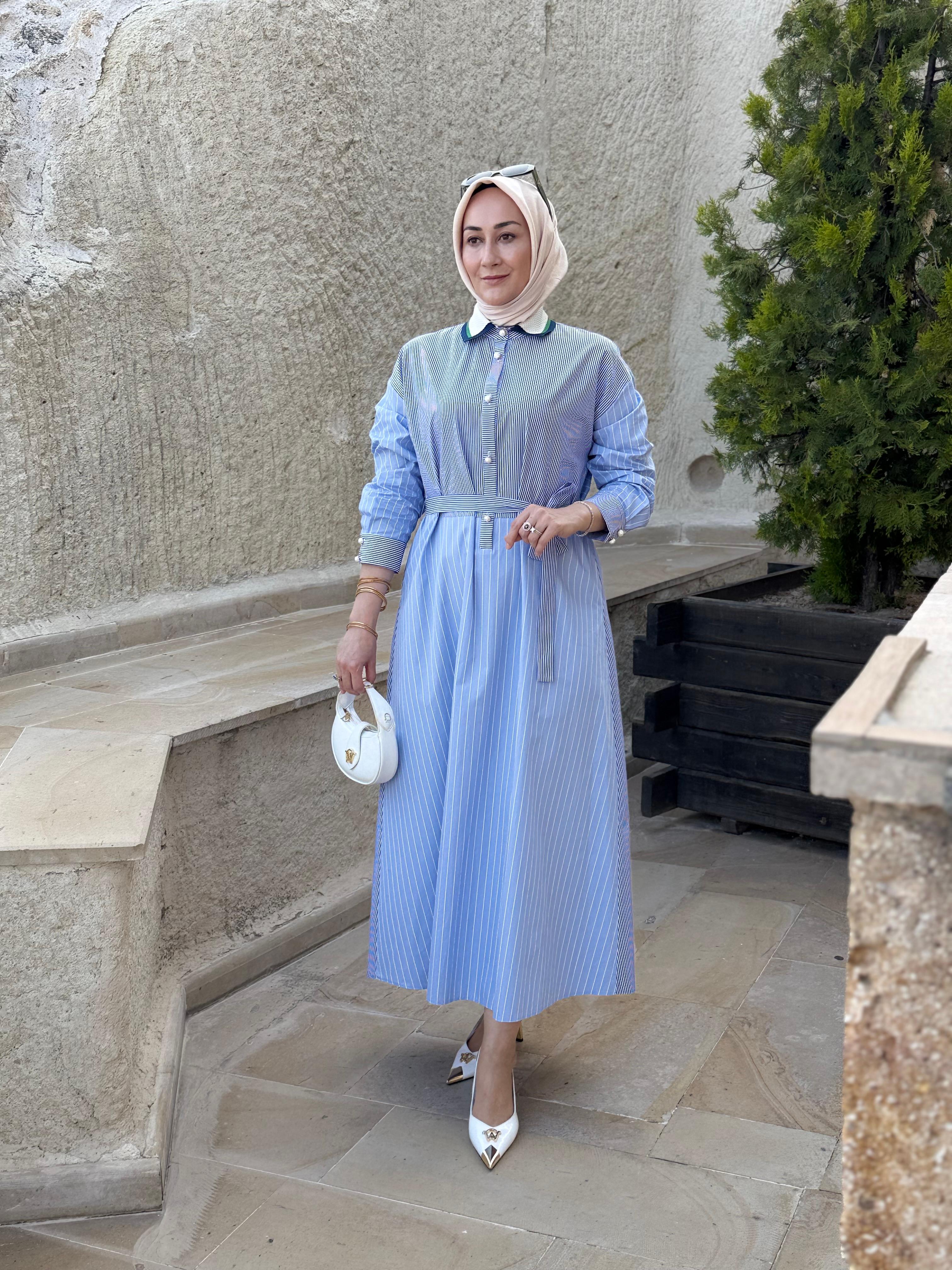 Ghisa Elbise