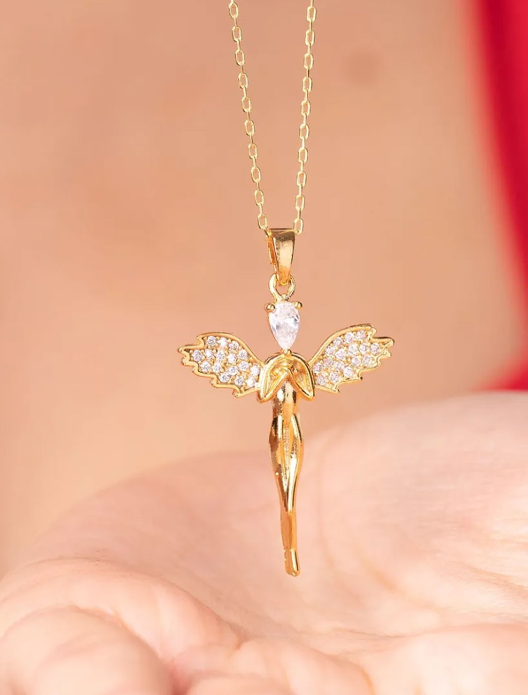 Çelik Gold Renk Zirkon Taş Detay Melek Kanatlı İnsan Model Kadın Kolye