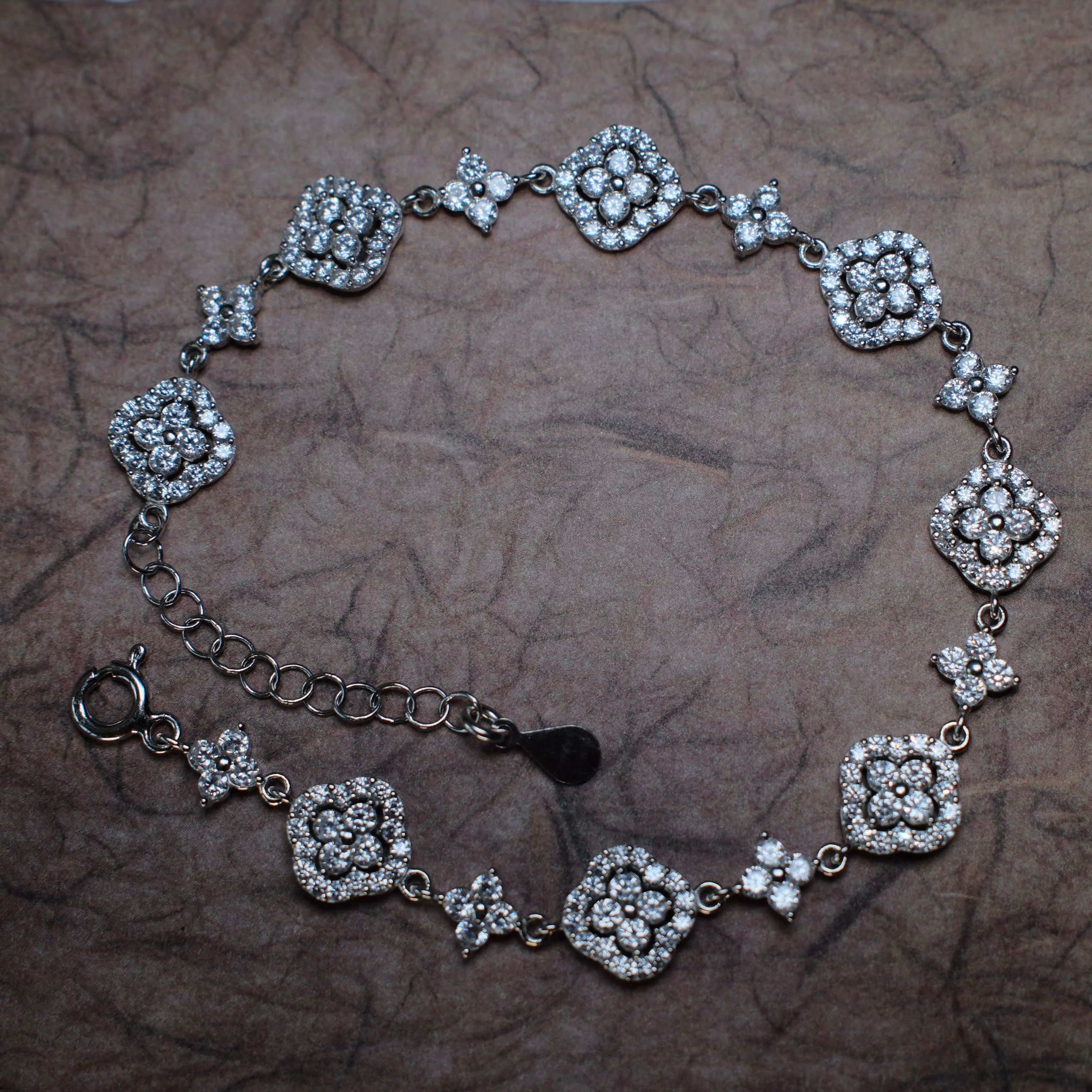 Four Star Tennis Bracelet