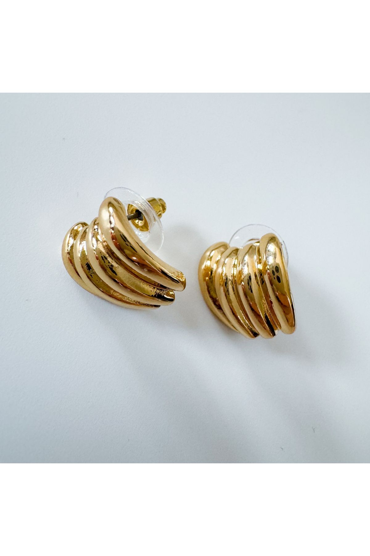 Çelik mini çizgili oval küpe