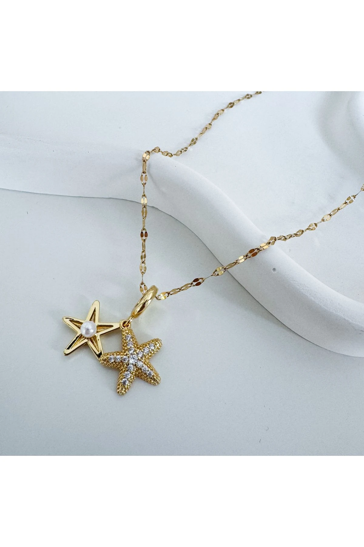 Çelik inci yıldız kolye