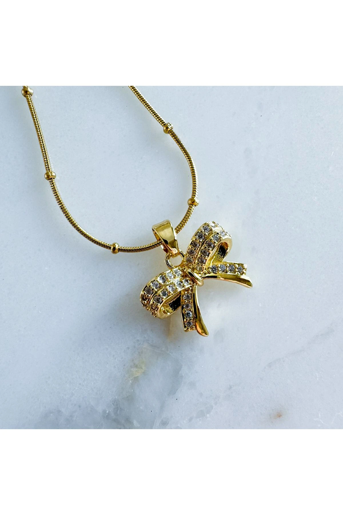 Çelik fiyonk kurdele kolye